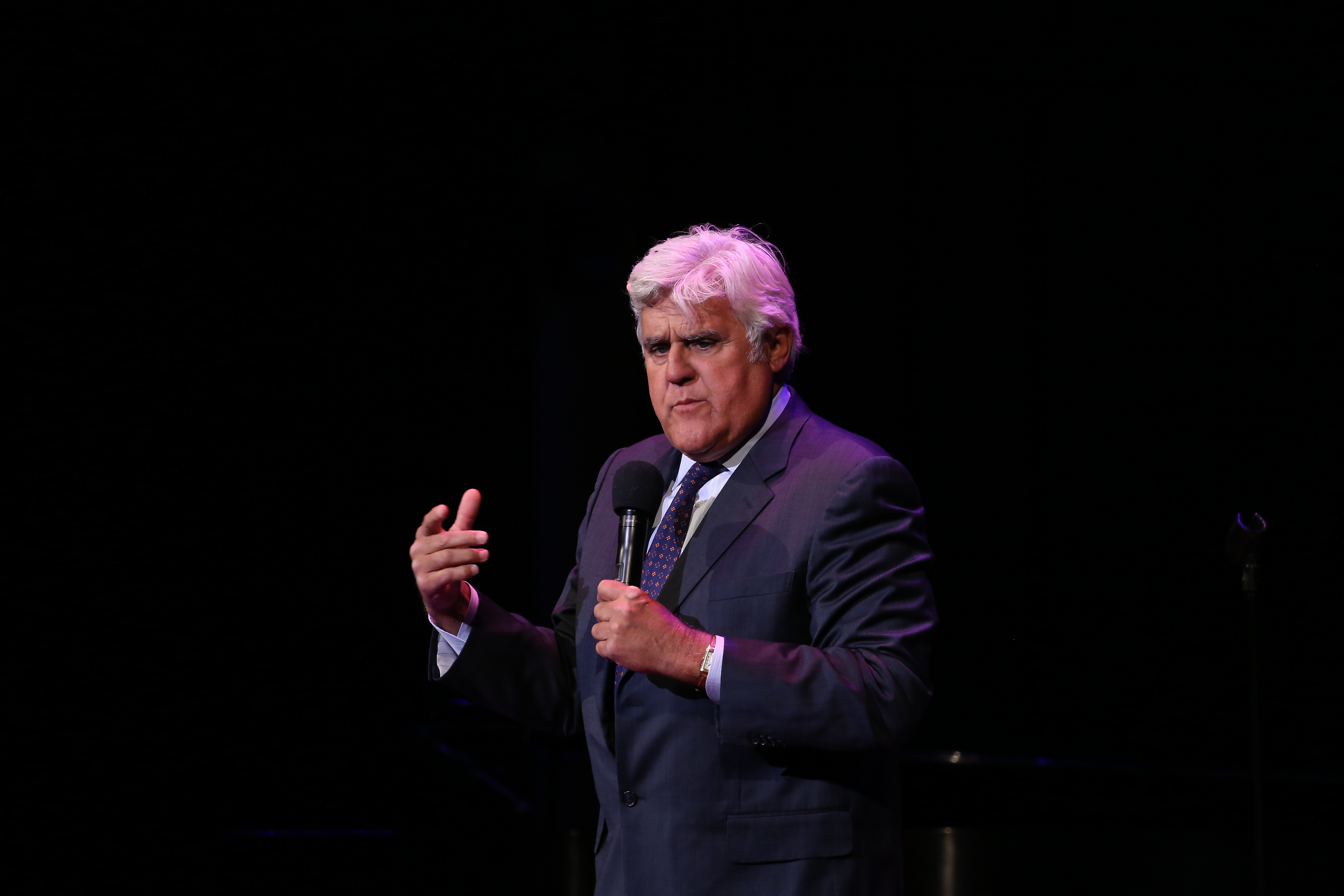 Jay Leno is pictured as he performs on stage during the National Night Of Laughter And Song event hosted by David Lynch Foundation at the John F. Kennedy Center for the Performing Arts on June 5, 2017, in Washington, DC | Source: Getty Images