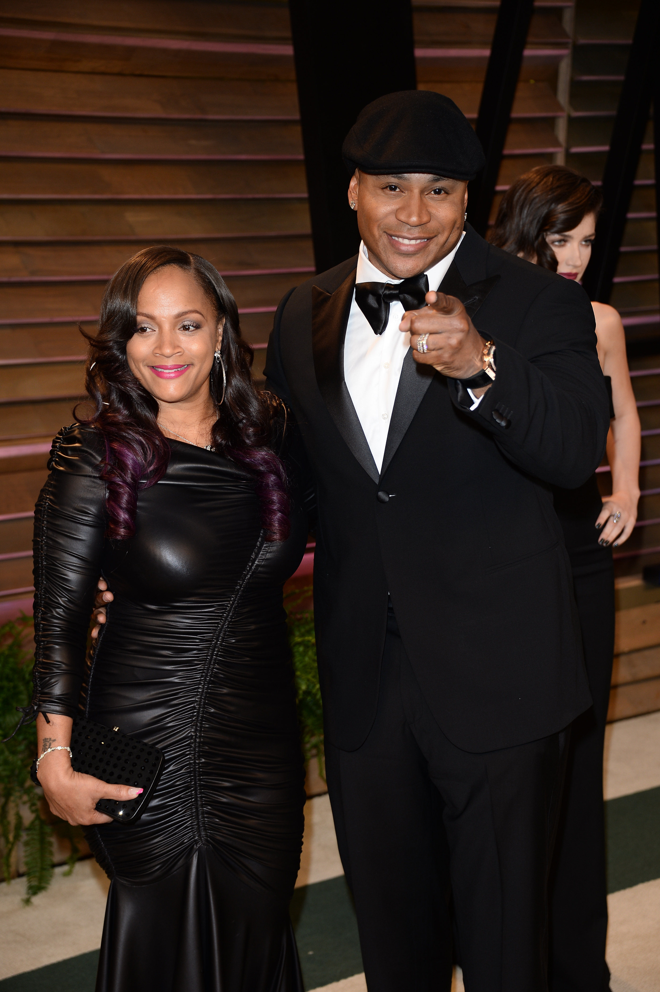 Simone Smith and LL Cool J arrive at the 2014 Vanity Fair Oscar Party | Source: Getty Images