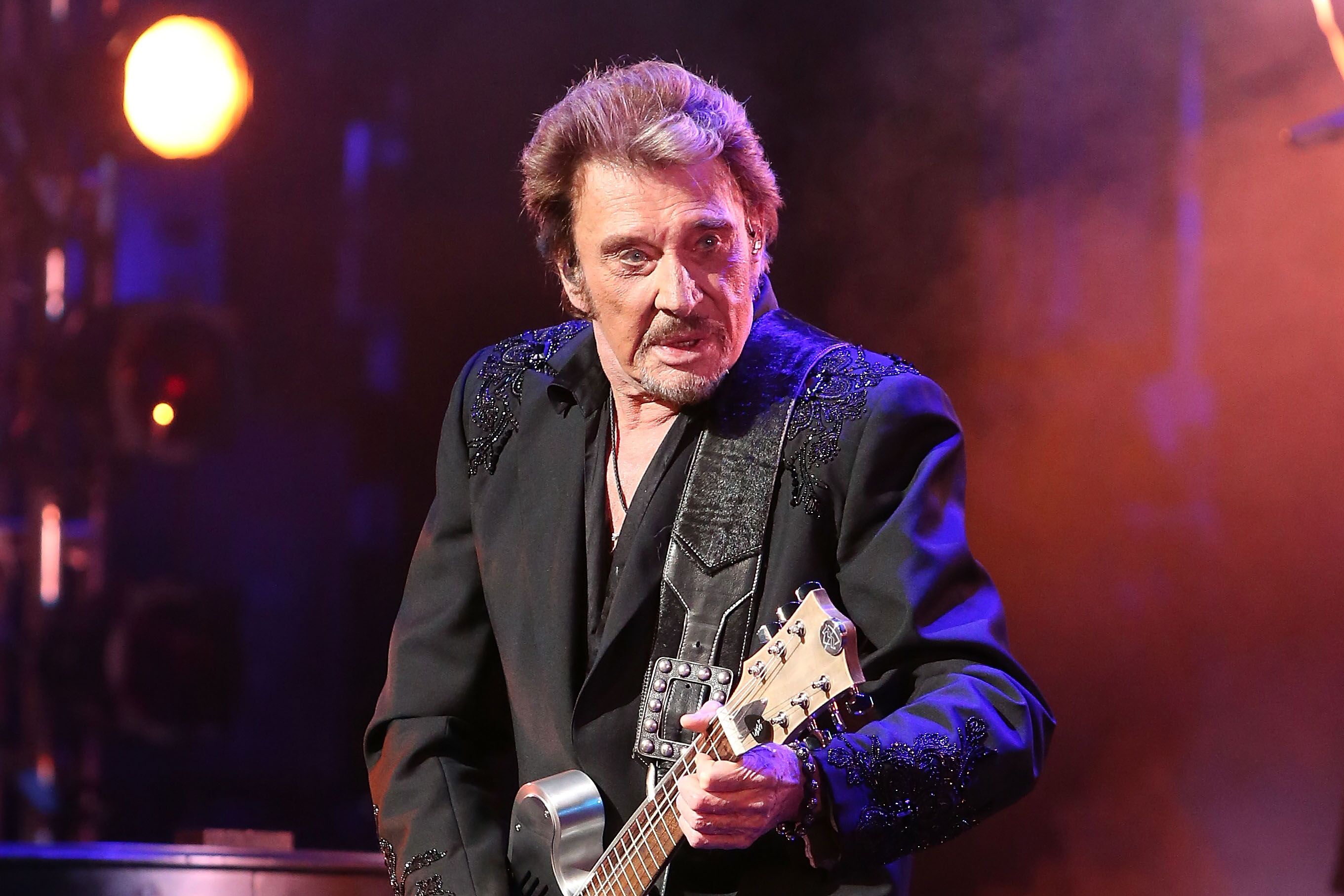 Johnny Hallyday chante sur scène au Beacon Theatre le 6 mai 2014 à New York. | Photo : Getty Images Johnny Hallyday chante sur scène au Beacon Theatre le 6 mai 2014 à New York. | Photo : Getty Images