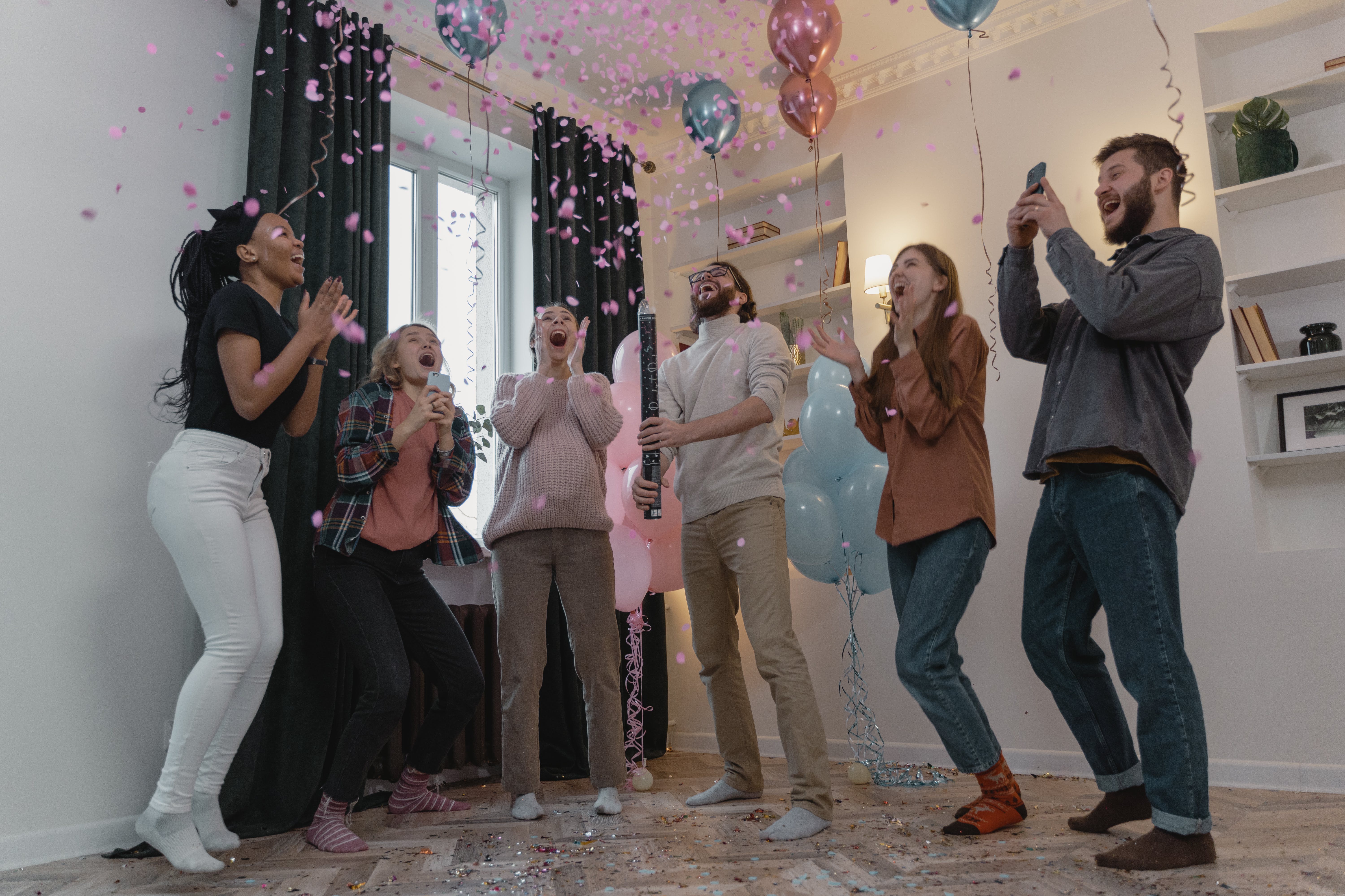 A group of people having a gender reveal party | Source: Pexels