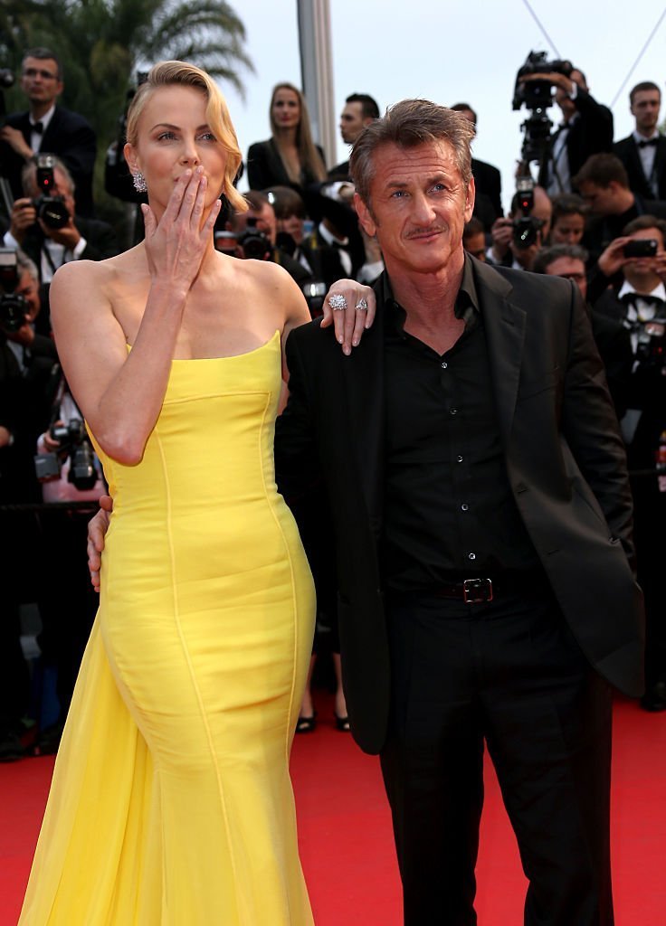 Sean Penn and Charlize Theron attend Premiere of "Mad Max: Fury Road" during the 68th annual Cannes Film Festival | Getty Images