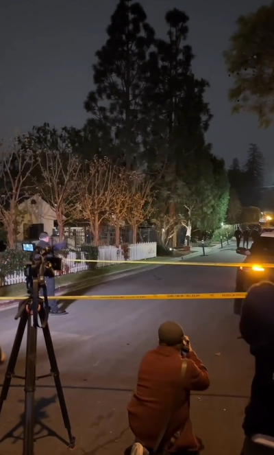 Media teams outside Michele and Rob Reiner's residence as seen in a video posted on December 15, 2025 | Source: Instagram/people