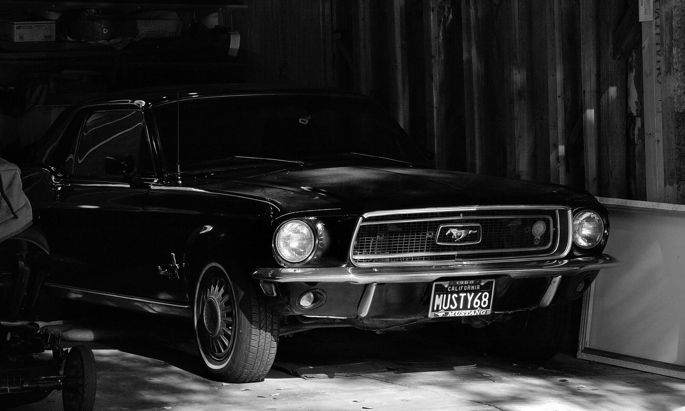 Andrew explains they are restoring an old Mustang for a veterans' charity event | Source: Pexels