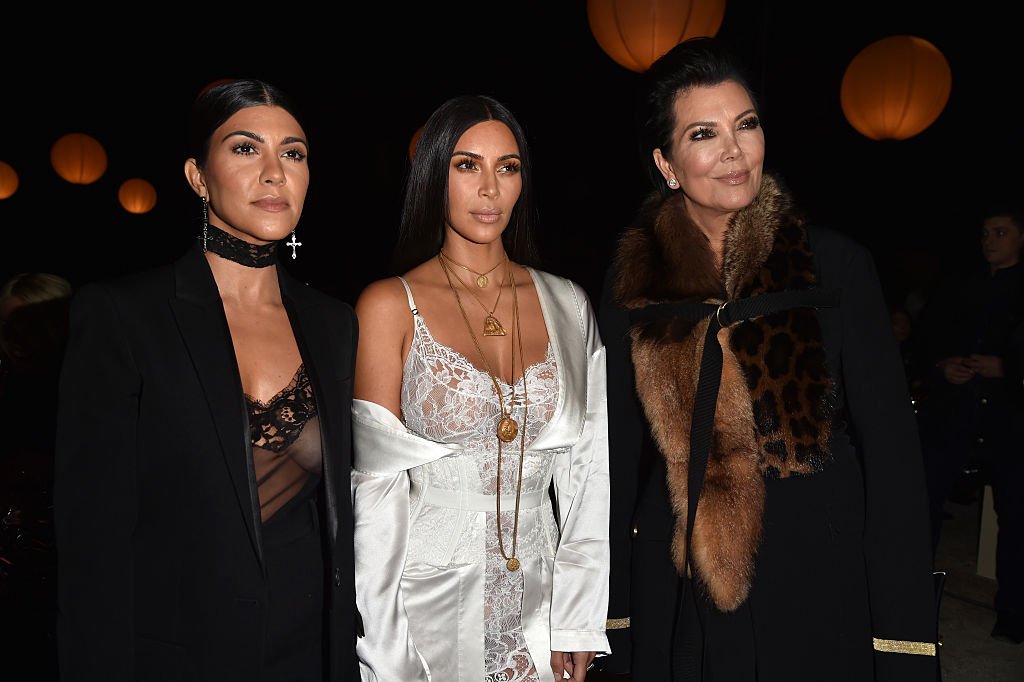 Kris Jenner with her daughters, Kourtney and Kim Kardashian at the Givenchy show in Paris in October 2016. | Photo: Getty Images