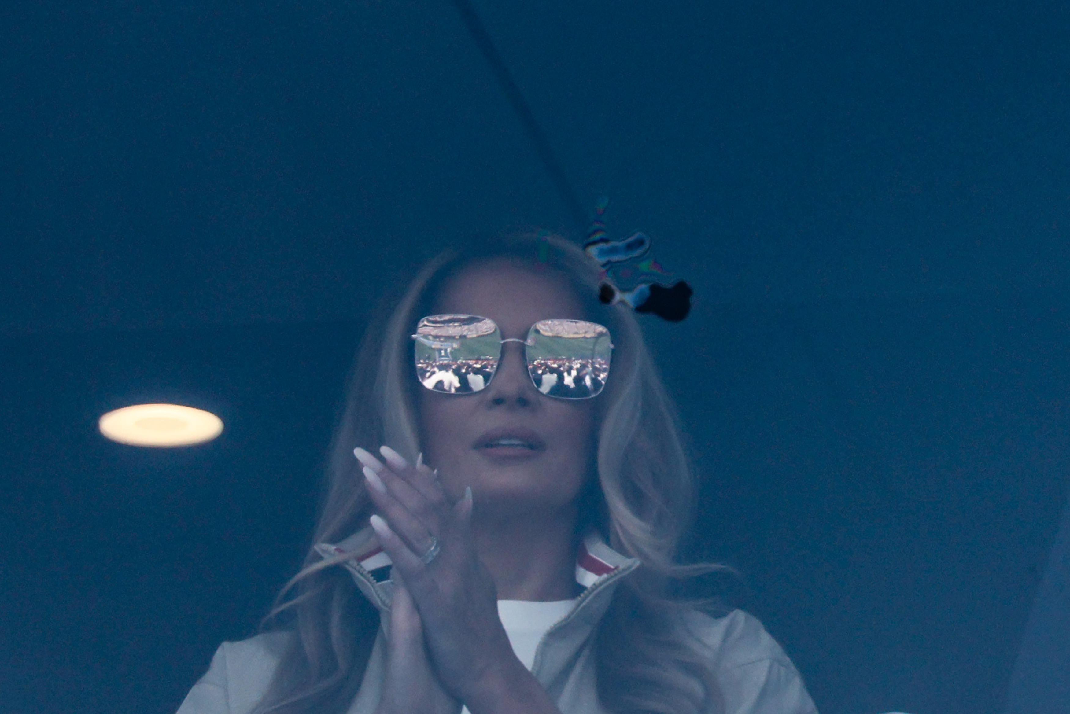 The highly reflective frames drew comparisons to 3D movie glasses and eclipse eyewear online. They also made the first lady's appearance look dramatically different depending on the lighting and camera angle. | Source: Getty Images