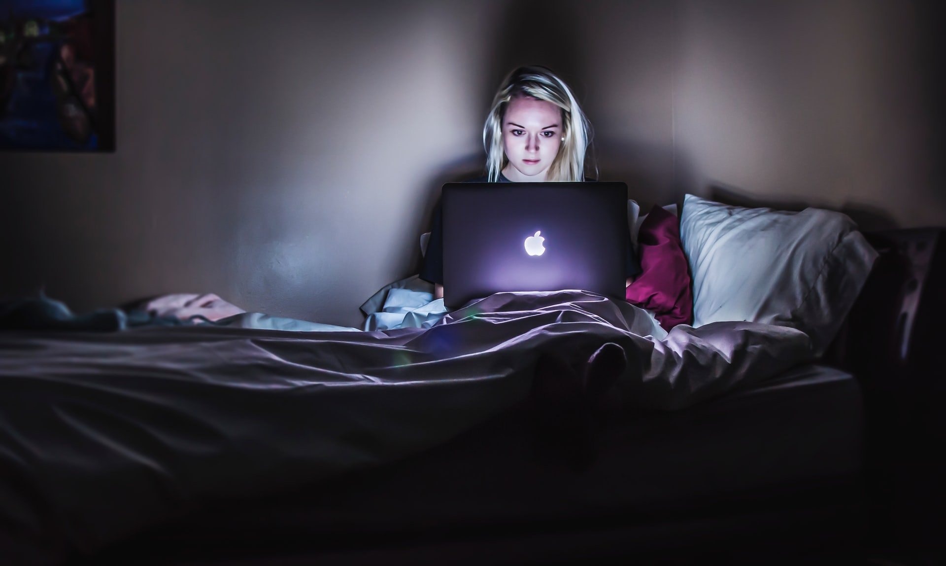 A lady studying her DNA test results in detail | Photo: Unsplash