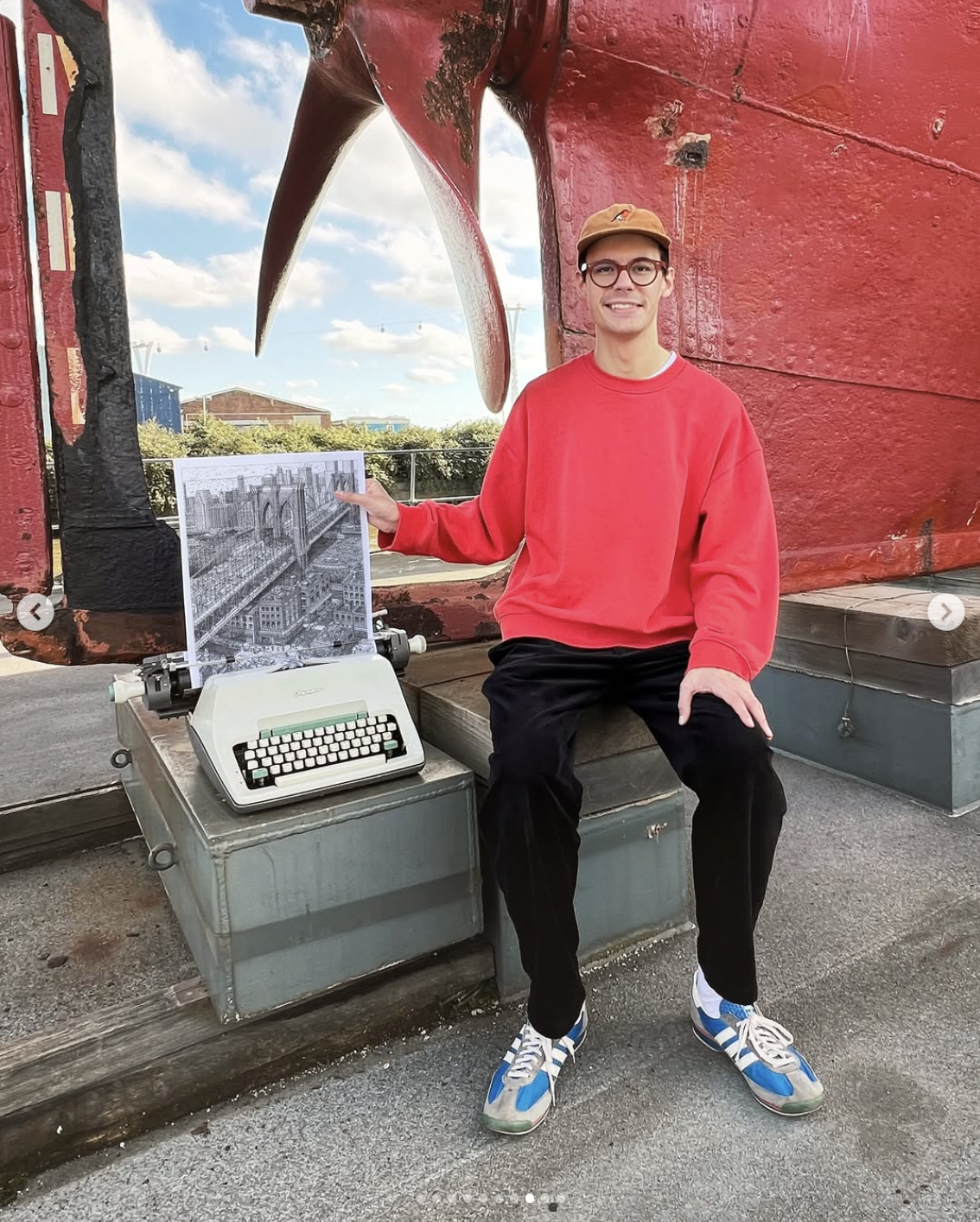 James Cook showing his typewriter art on location | Source: instagram/jamescookartwork