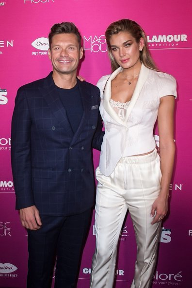 Ryan Seacrest and Shayna Taylor  at Magic Hour Rooftop Bar & Lounge on September 12, 2018 in New York City | Photo: Getty Images