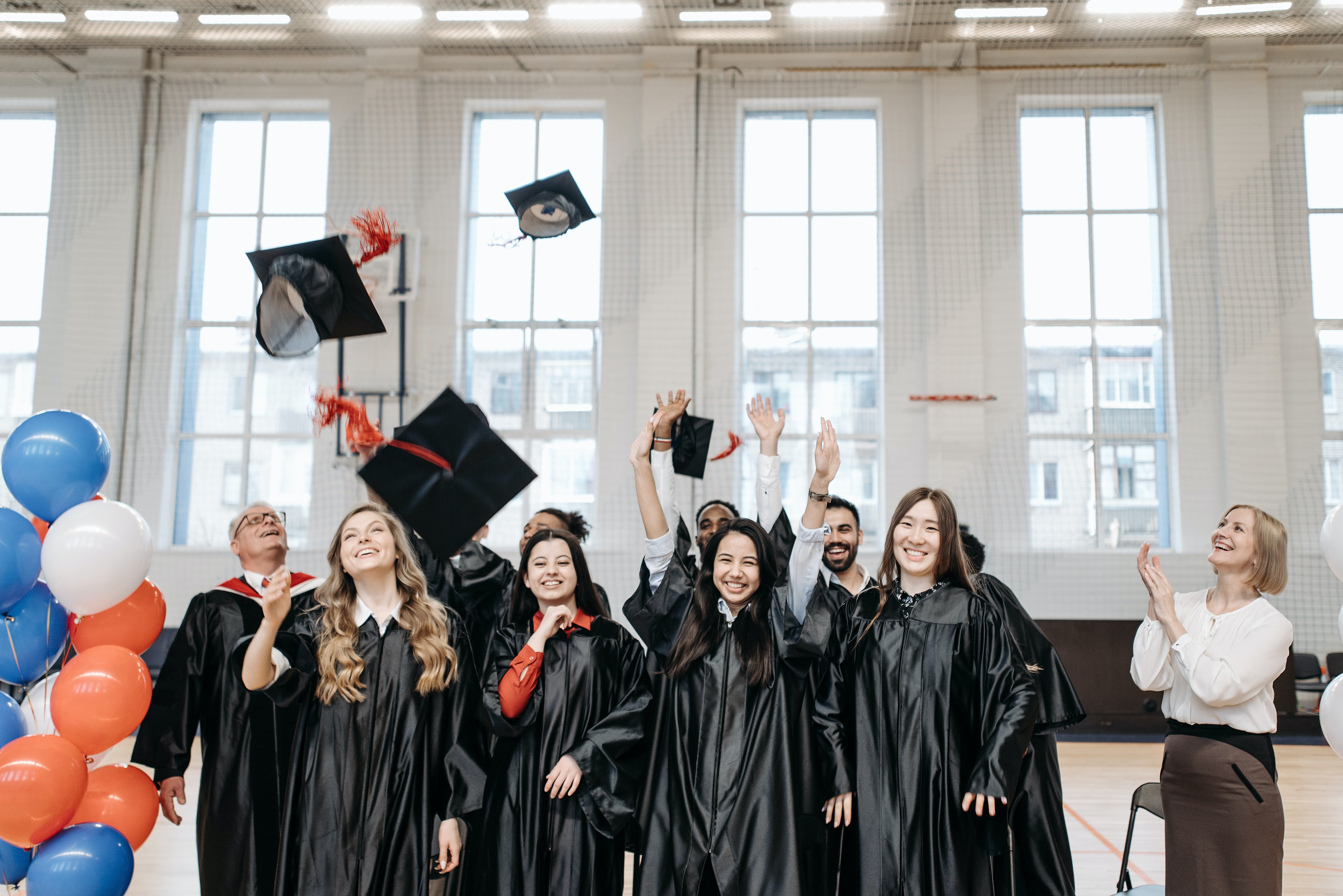Students after receiving their high school diplomas | Source: Pexels