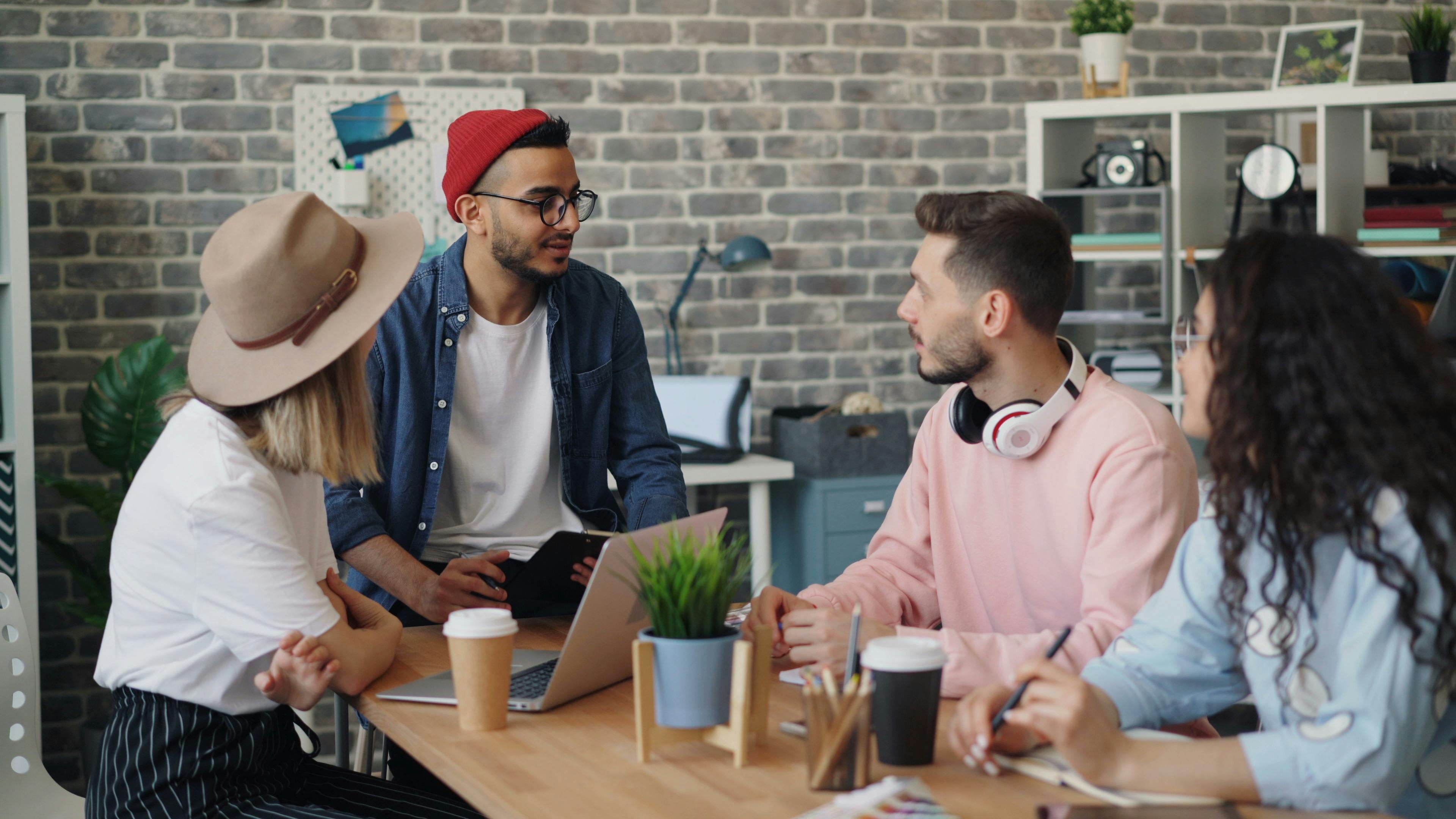 Four colleagues discussing something | Source: Pexels