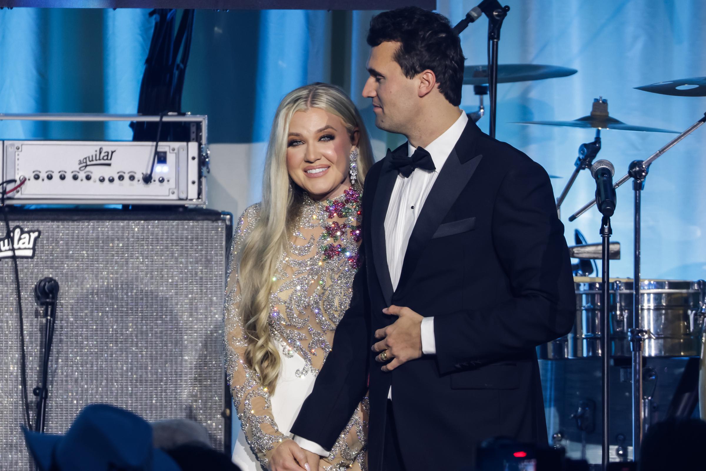 Erika Lane Frantzve and Charlie Kirk on stage during the Turning Point USA Inaugural-Eve Ball at the Salamander Hotel on January 19, 2025, in Washington, DC | Source: Getty Images