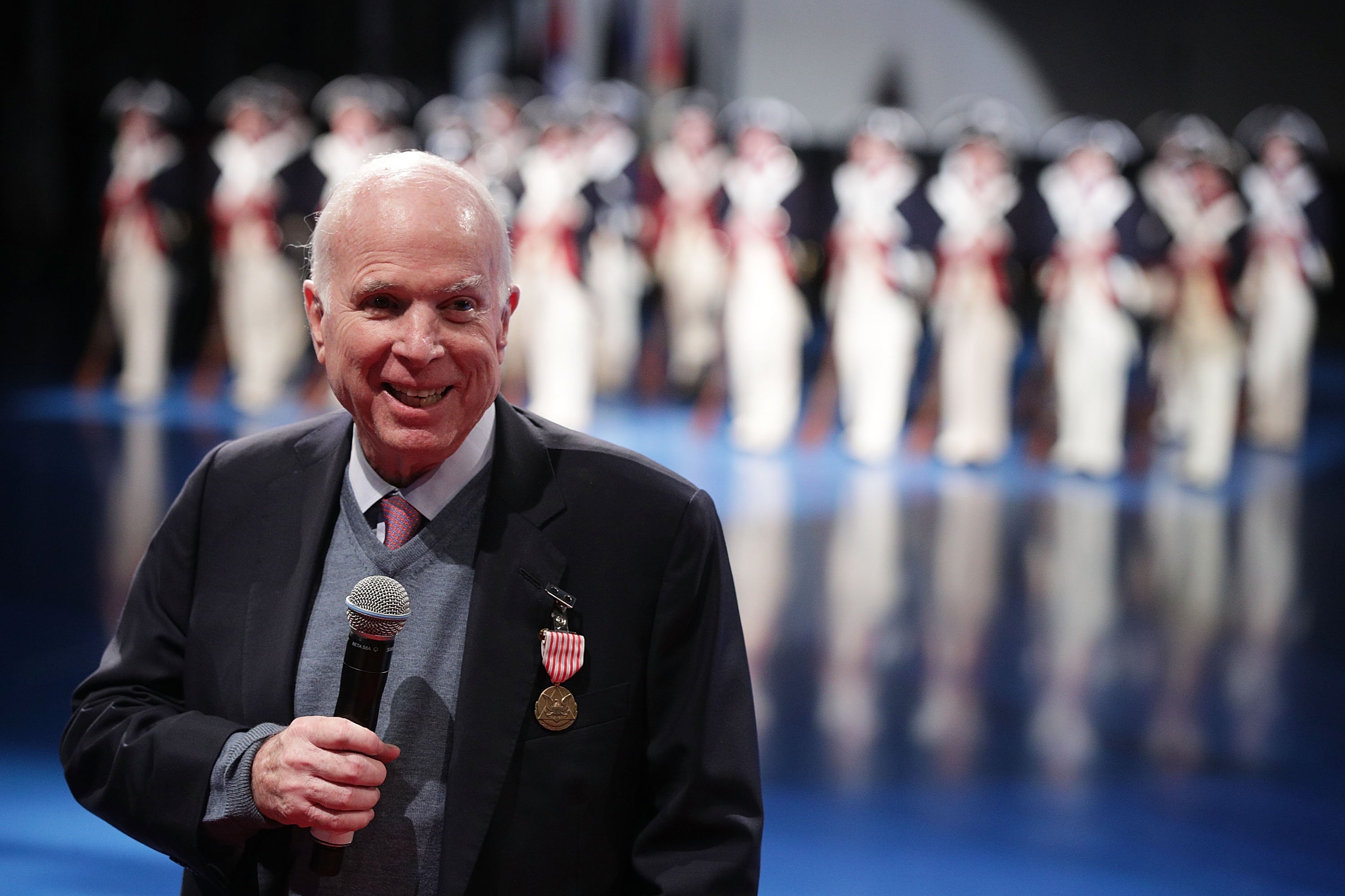 Late sen. John McCain after receiving a Civilian Service Medal. | Source: Getty Images