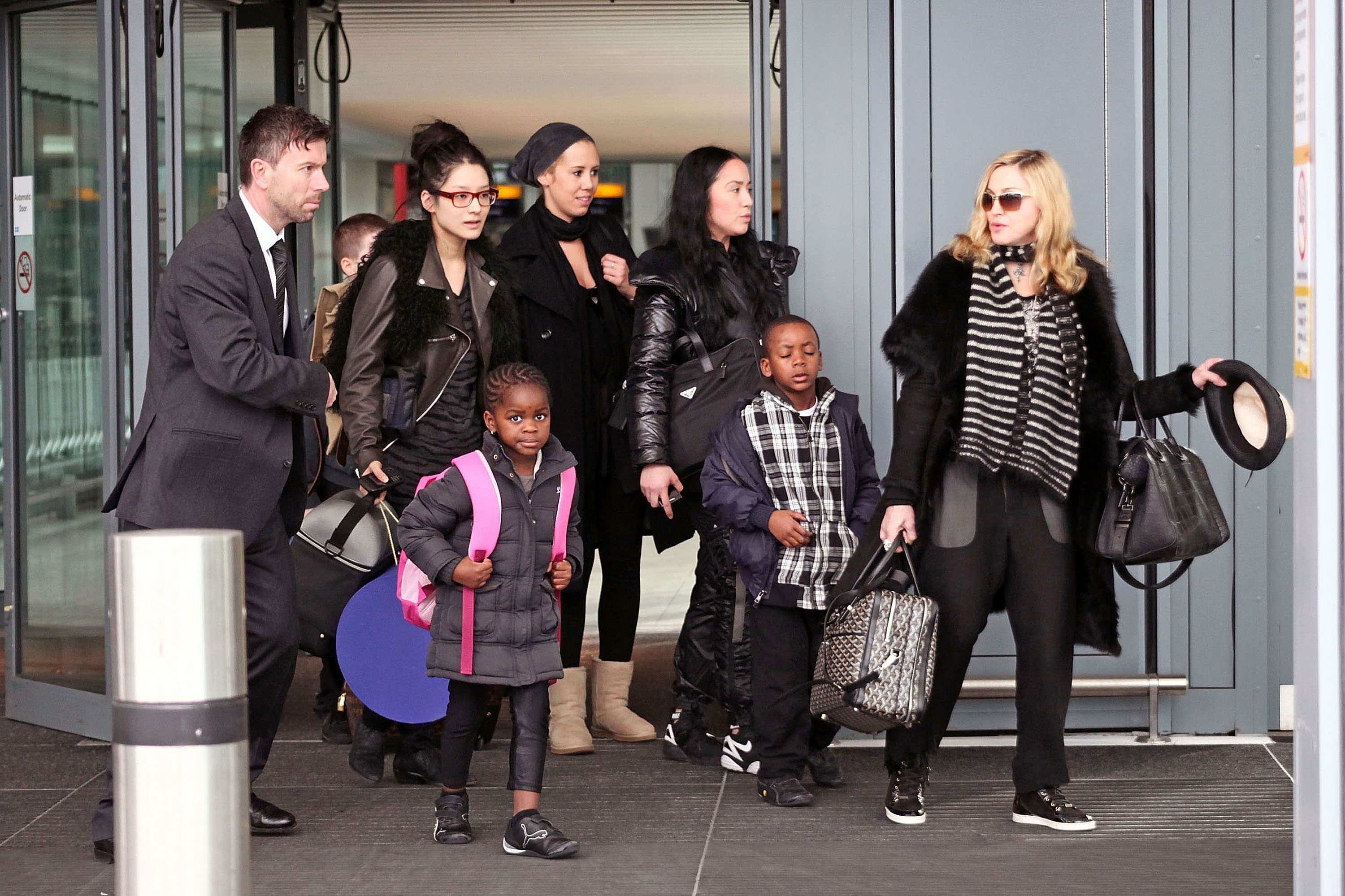Madonna photographed at Heathrow Airport with her children on April 2, 2011 in London, United Kingdom. | Source: Getty Images