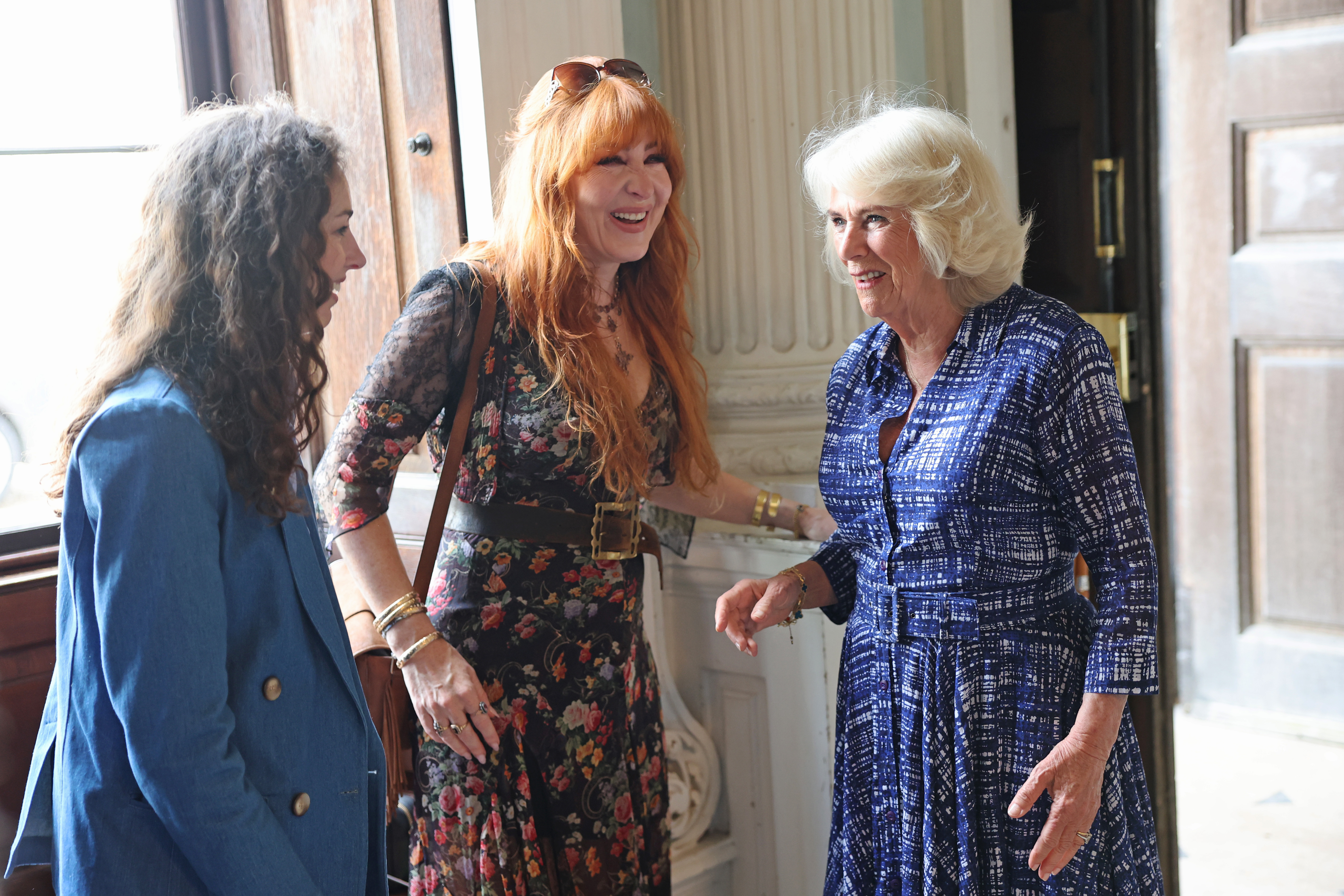 Lady Rose Hanbury, Charlotte Tilbury, and Queen Camilla having a conversation during the Badminton Horse Trials in Badminton, Gloucestershire on May 12, 2024 | Source: Getty Images
