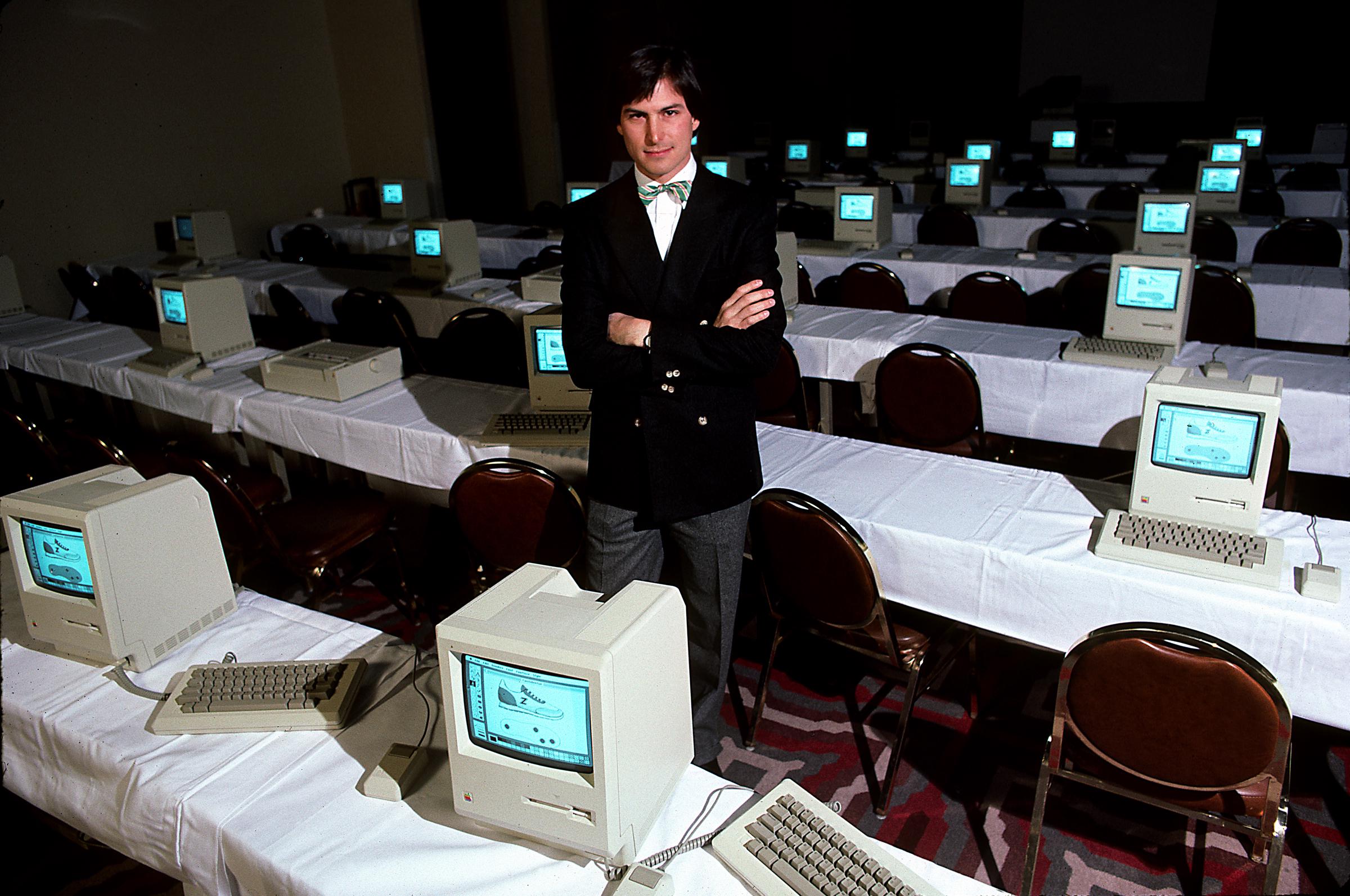Steve Jobs with room full of computers, circa 1984 | Source: Getty Images