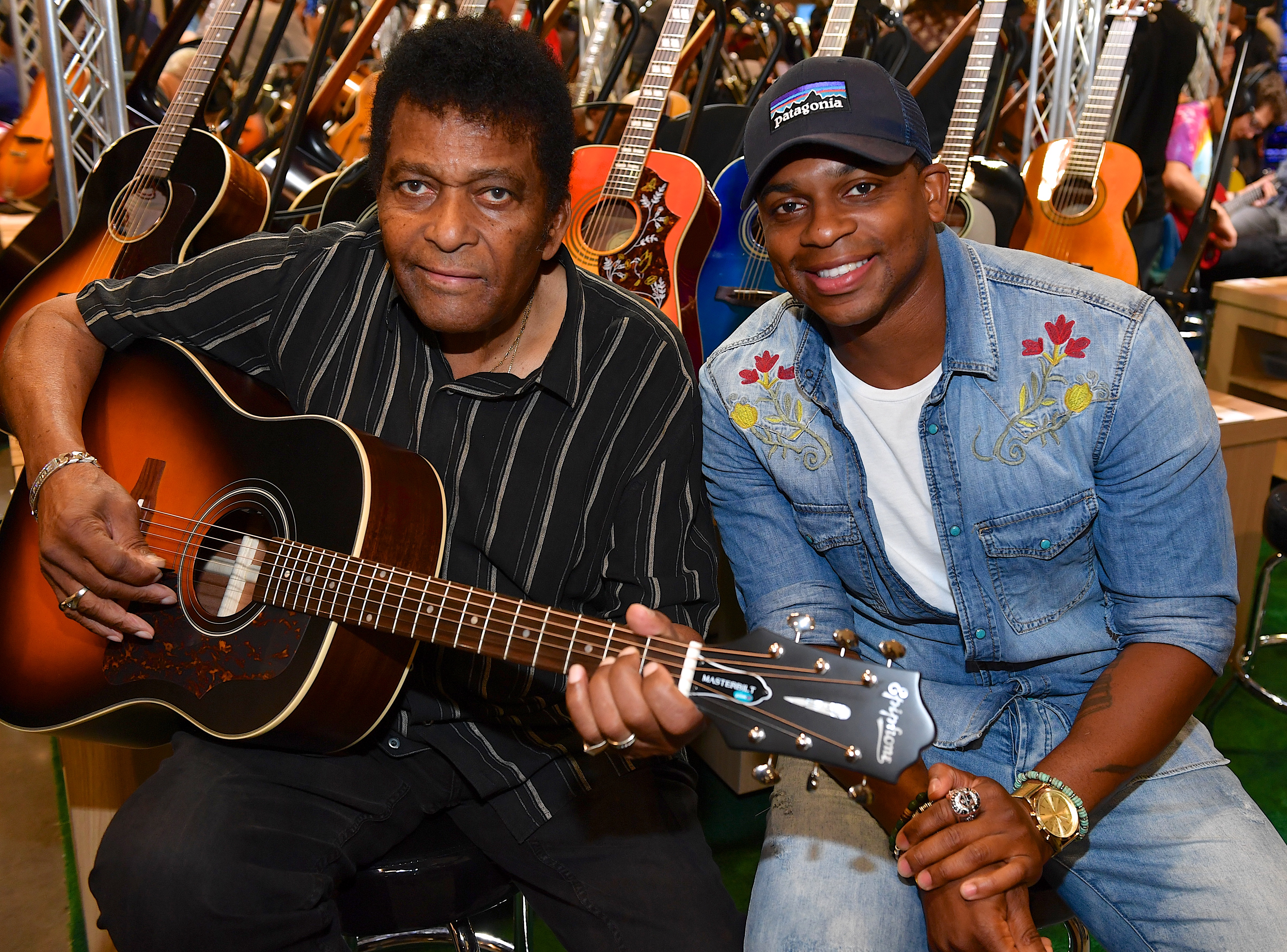 Charley Pride with Jimmy Allen during Summer NAMM Show Music Industry Day at Music City Center, on July 15, 2017 in Nashville, Tennessee. | Source: Getty Images