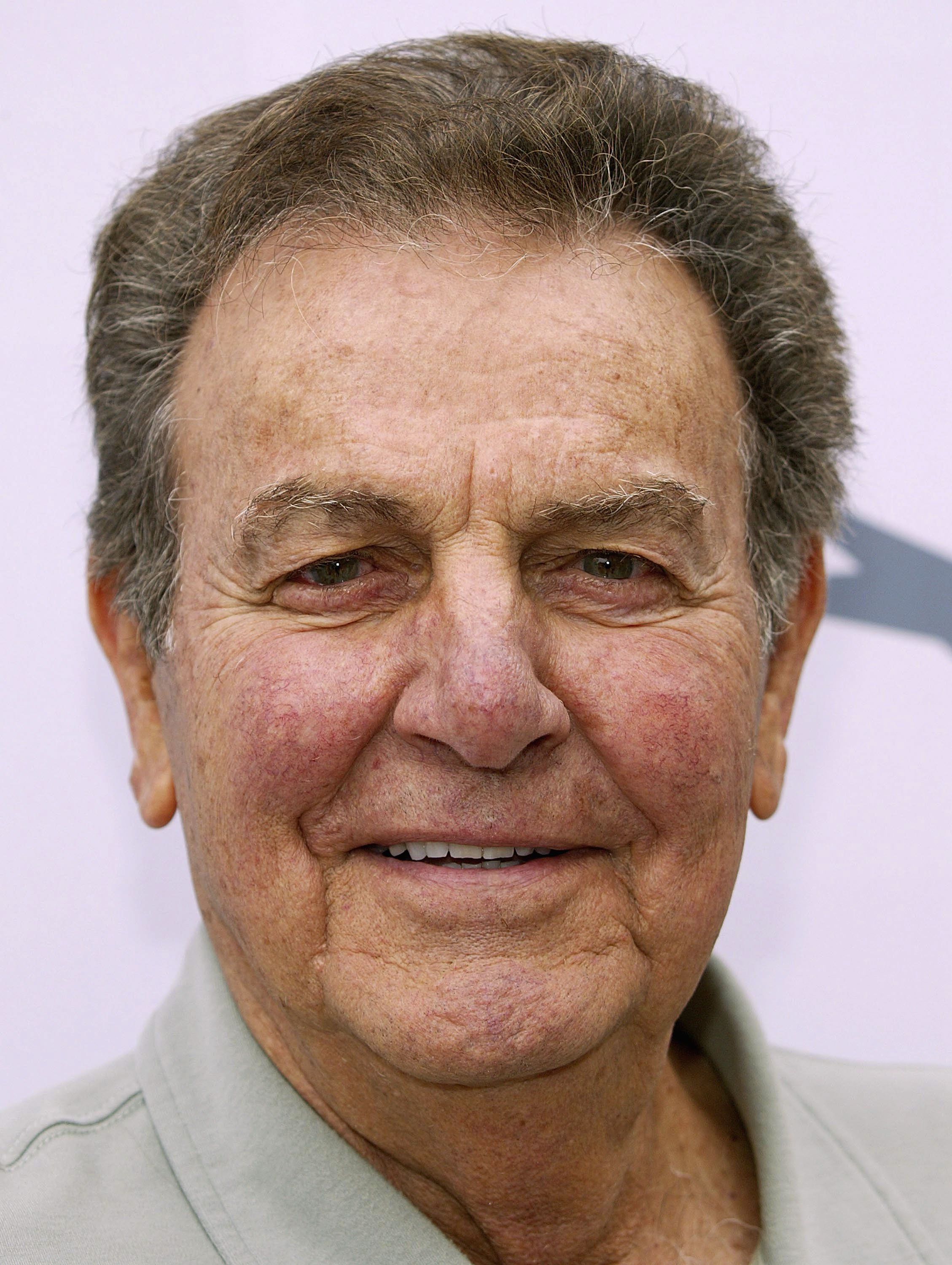 Actor Mike Connors attends the Eighth Annual American Film Institute Golf Classic at the Riviera Country Club on September 19, 2005 in Brentwood, California. | Source: Getty Images