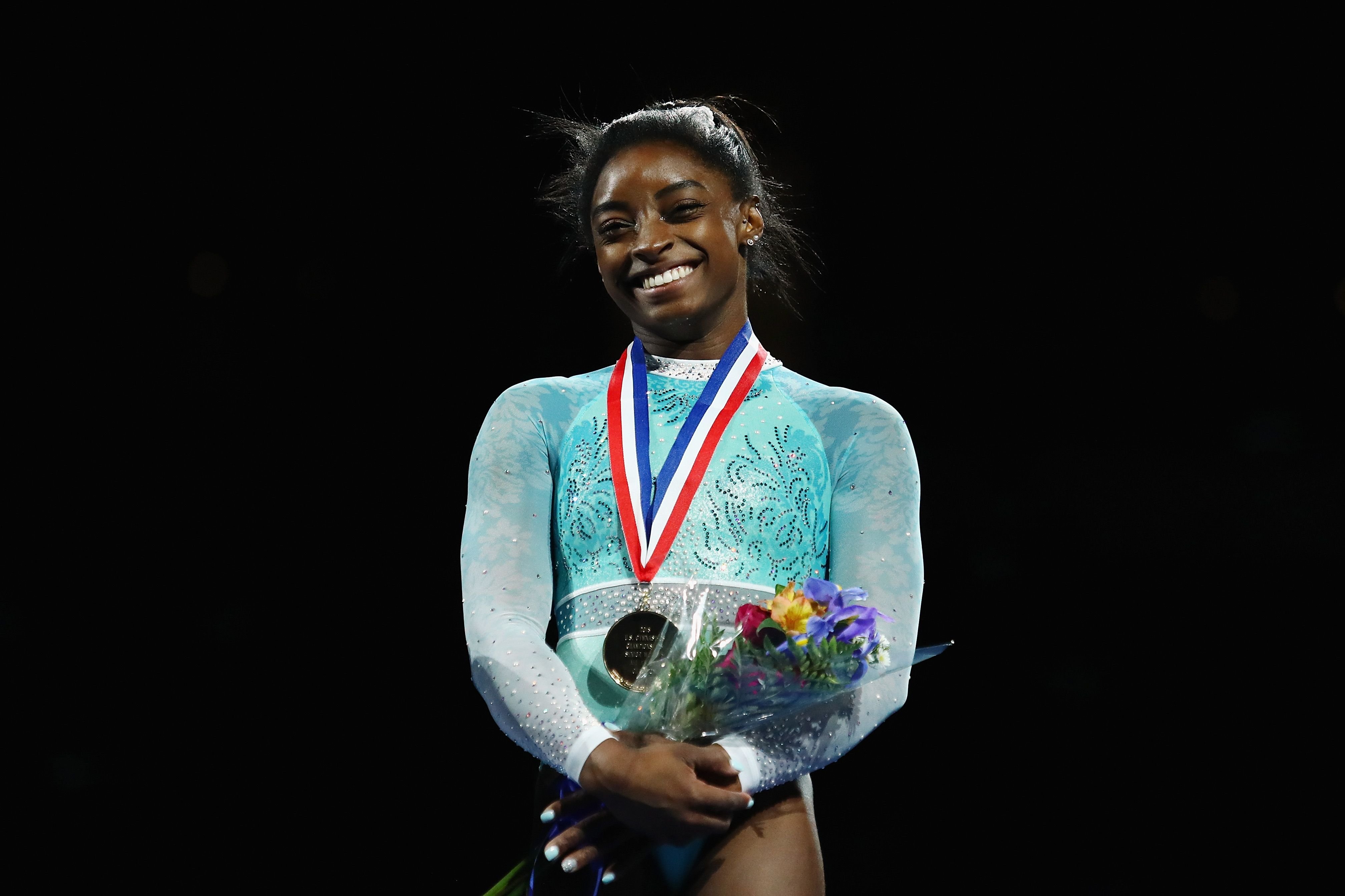 Simone Biles stands on the podium during day four of the U.S. Gymnastics Championships 2018 at TD Garden on August 19, 2018 in Boston, Massachusetts. | Photo: Getty Images.
