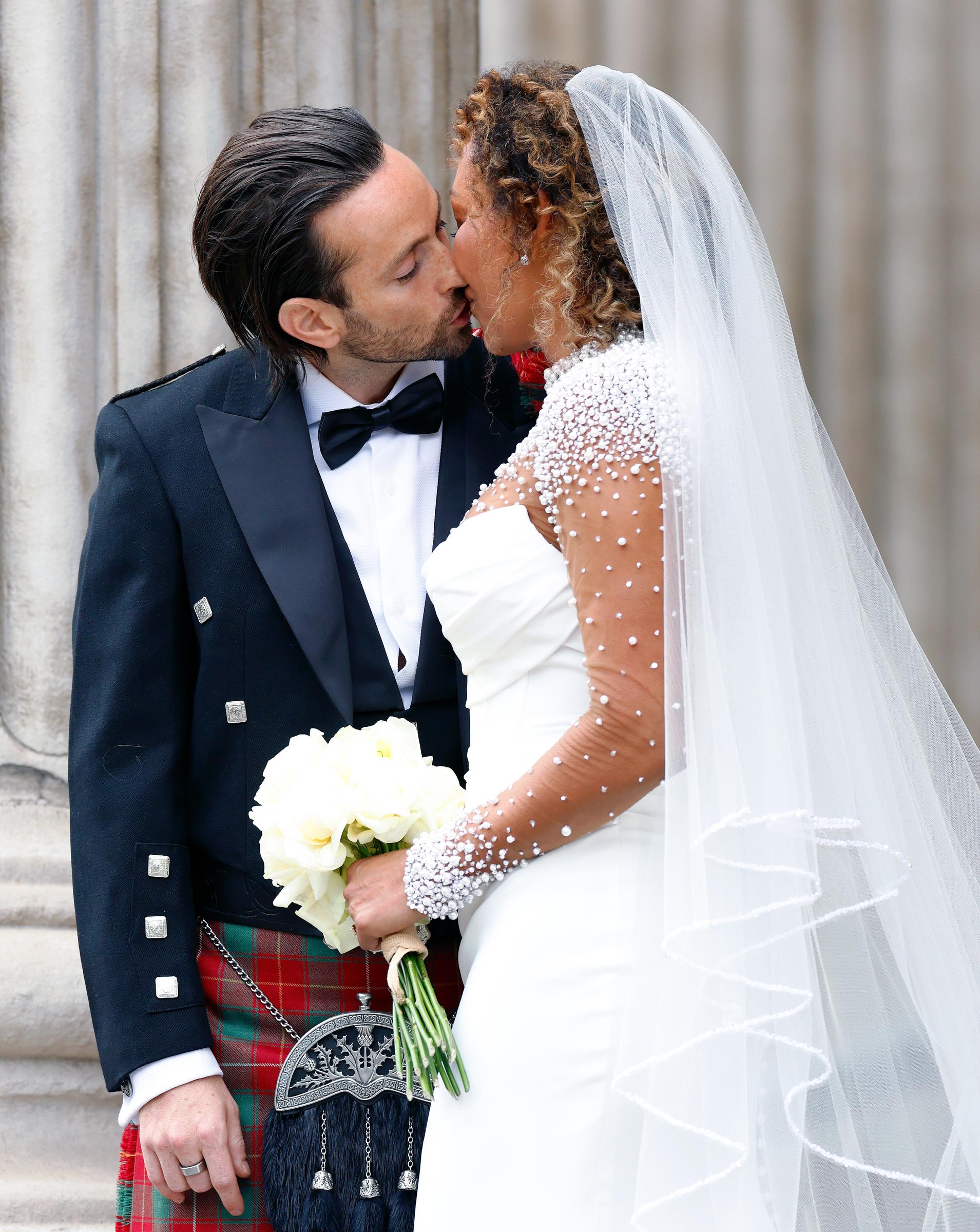 Rory McPhee and Mel B depart following their wedding in the OBE (Order of the British Empire) Chapel at St Paul's Cathedral on July 5, 2025 in London, England | Source: Getty Images
