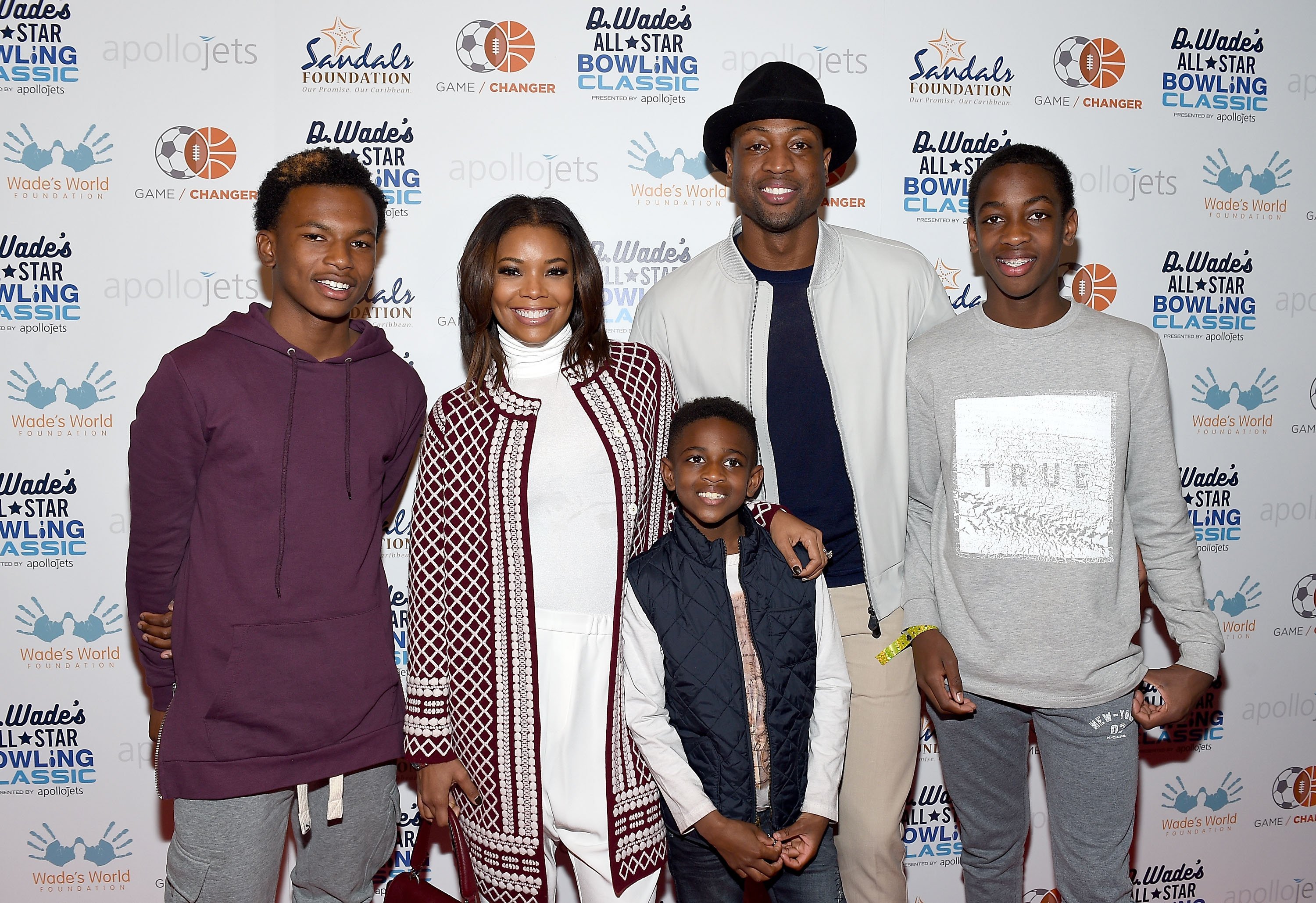 (From left) Dahveon Morris, Gabrielle Union, Zion Wade, Dwyane Wade, and Zaire Wade attend the DWade All Star Bowling Classic in Toronto, Canada on February 13, 2016 | Photo: Getty Images