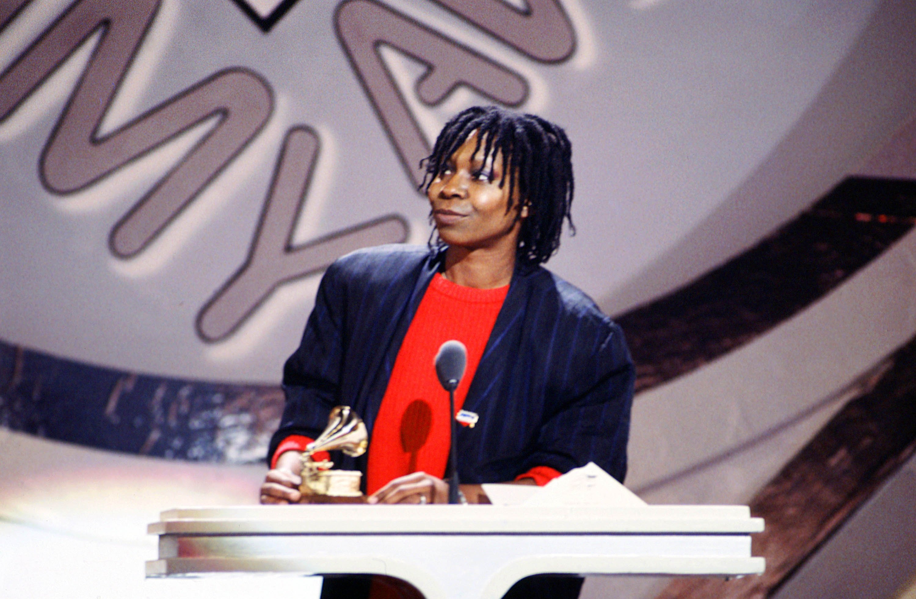 Whoopi Goldberg is pictured on stage at the 28th Annual Grammy Awards at the Shrine Auditorium on February 25, 1986, in Los Angeles, California| Source: Getty Images