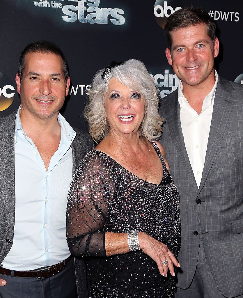 Paula Deen with sons Bobby Deen and Jamie Deen at 'Dancing with the Stars' Season 21 | Source: Getty Images Paula Deen with sons Bobby Deen and Jamie Deen at 'Dancing with the Stars' Season 21 | Source: Getty Images