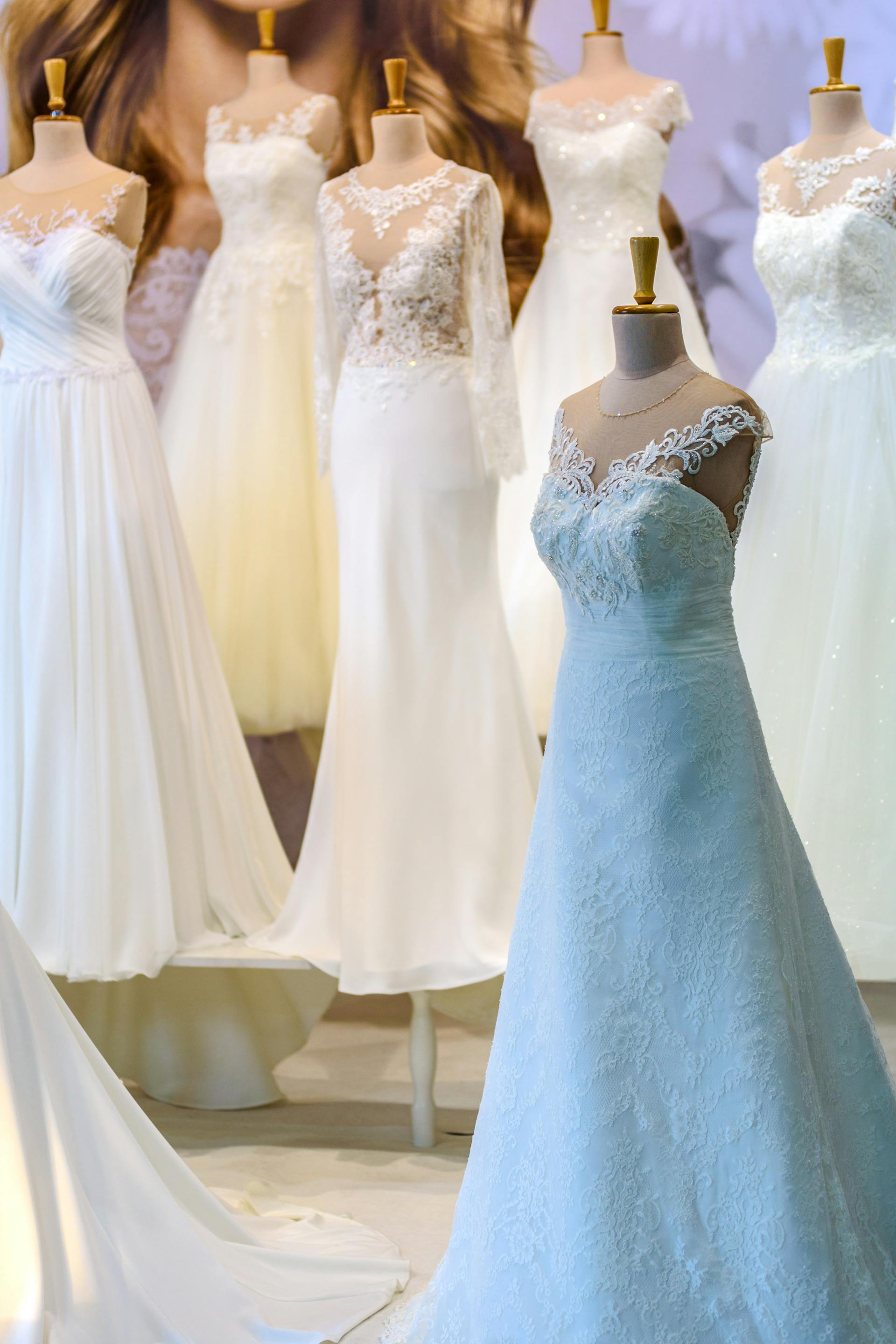 Different wedding dresses on mannequins | Source: Pexels