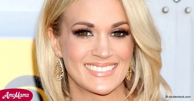 Carrie Underwood shows off figure in spicy dress while performing for the first time after face injury