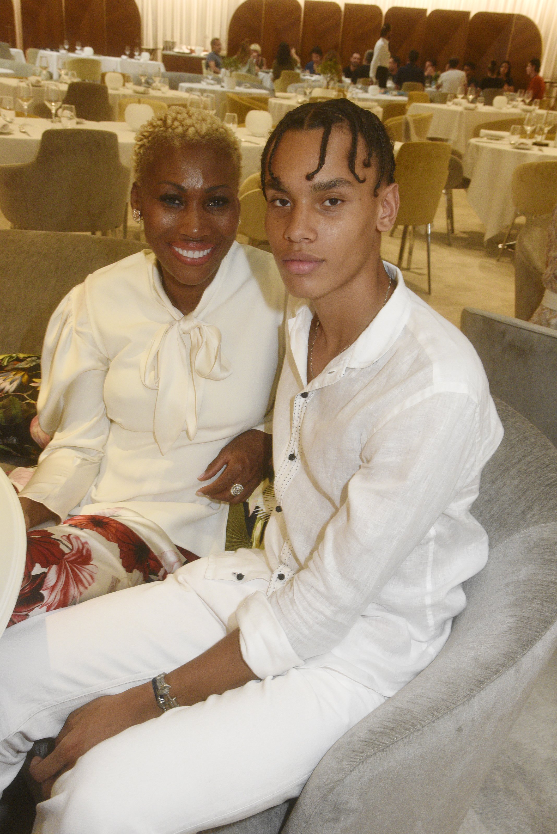 Nicole Coste and her son, Alexandre Grimaldi Coste at "Together" Monumental Sculpture by Lorenzo Quinn unveiling Cocktail at Hotel Mariott on July 06, 2021 in Cannes, France. | Source: Getty Images