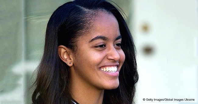 Malia Obama flaunts her body in tasteful black swimsuit while drinking wine in Miami in new photos