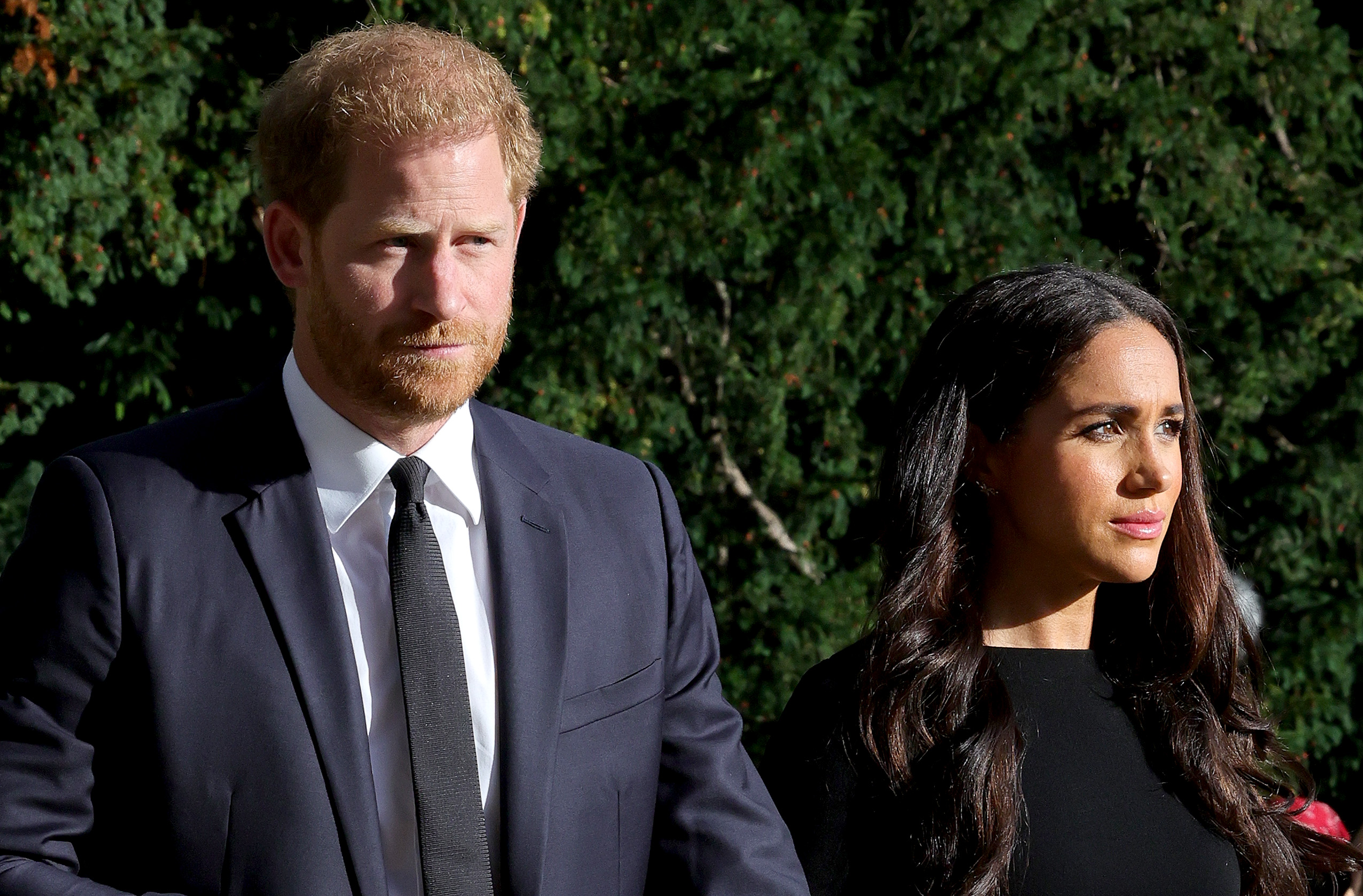 Prince Harry and Meghan Markle on the long Walk at Windsor Castle arrive to view flowers and tributes to HM Queen Elizabeth on September 10, 2022 in Windsor, England | Source: Getty Images