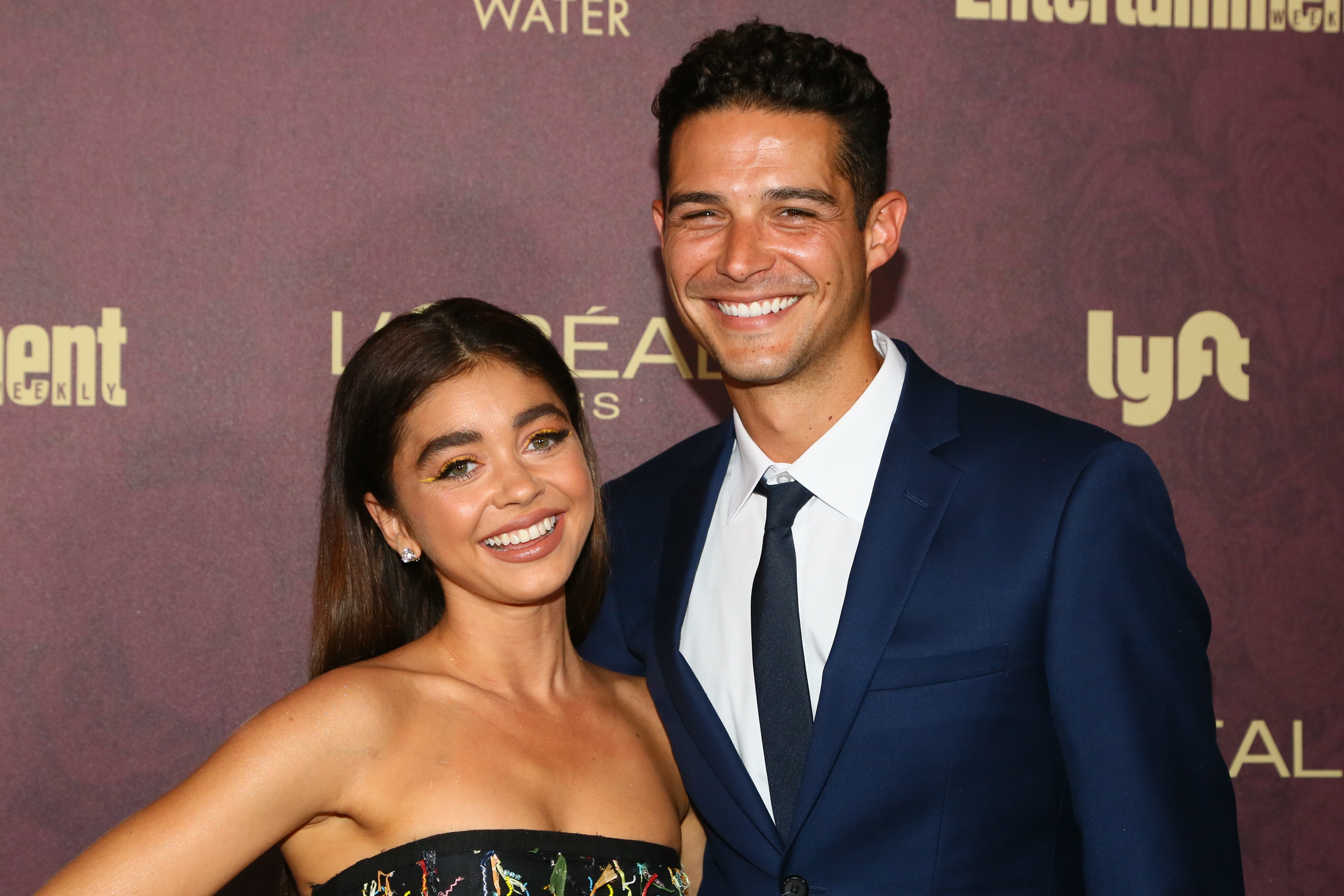 Sarah Hyland (L) and Wells Adams arrive to the 2018 Entertainment Weekly Pre-Emmy Party at Sunset Tower Hotel on September 15, 2018, in West Hollywood, California. | Source: Getty Images.