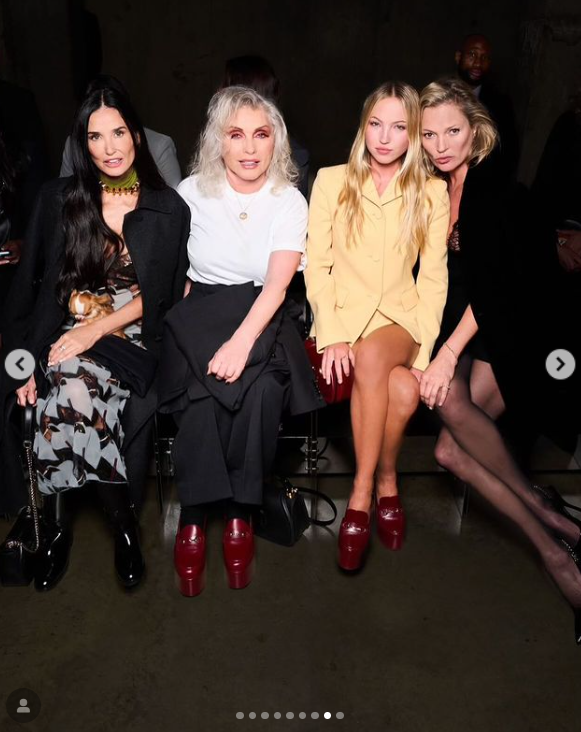Demi Moore, Blondie, Lila Moss and her mother, Kate Moss seated together at the Gucci Cruise 2025 Fashion Show, dated May 2024. | Source: Instagram/demimoore