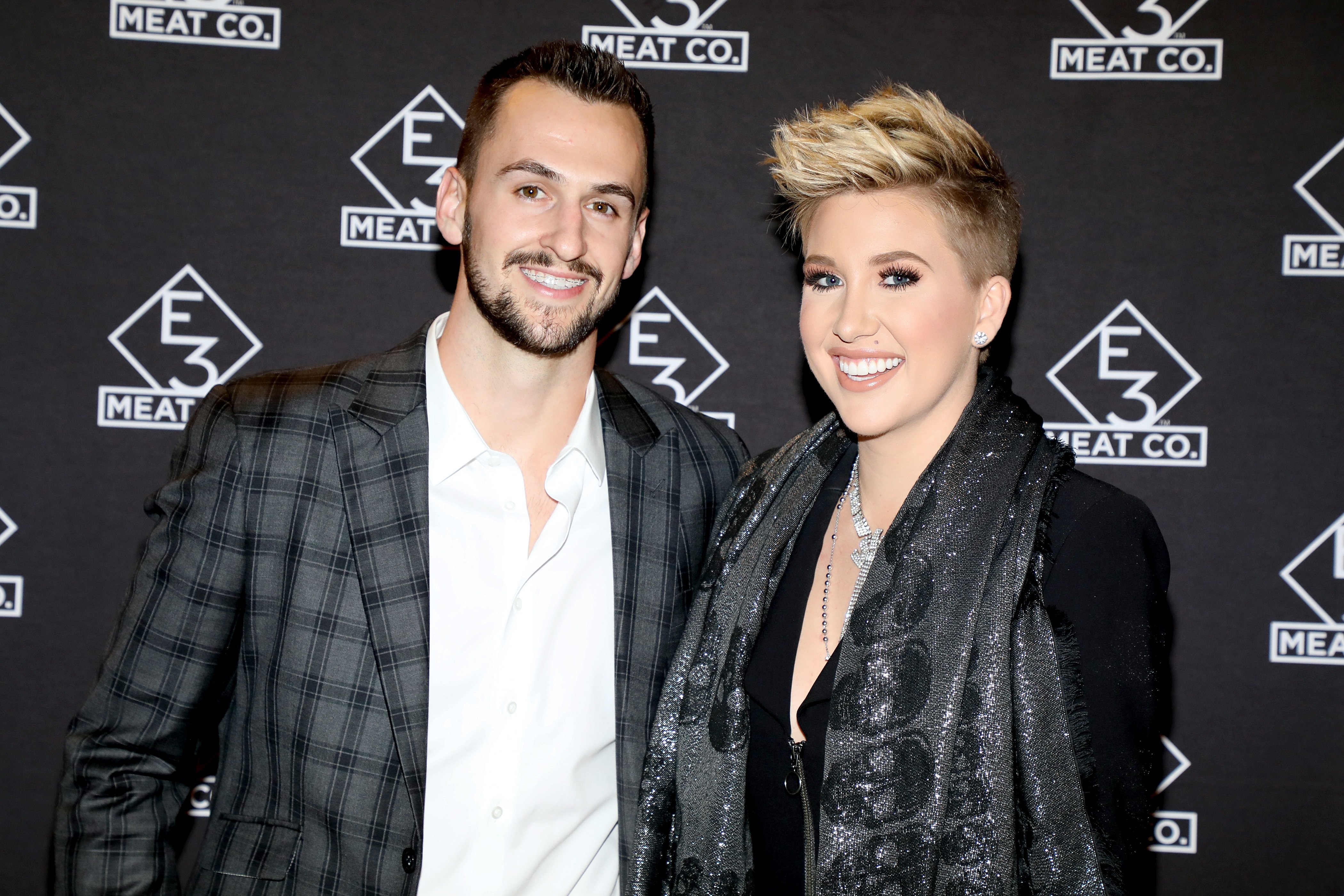 Nic Kerdiles and Savannah Chrisley attend the grand opening of E3 Chophouse Nashville on November 20, 2019. | Photo: Getty Images.