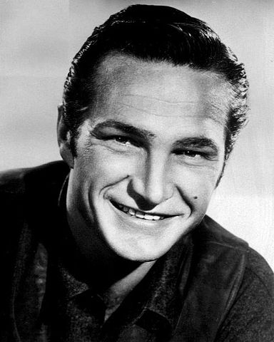 Eric Fleming in 1961. | Source: Wikimedia Commons.