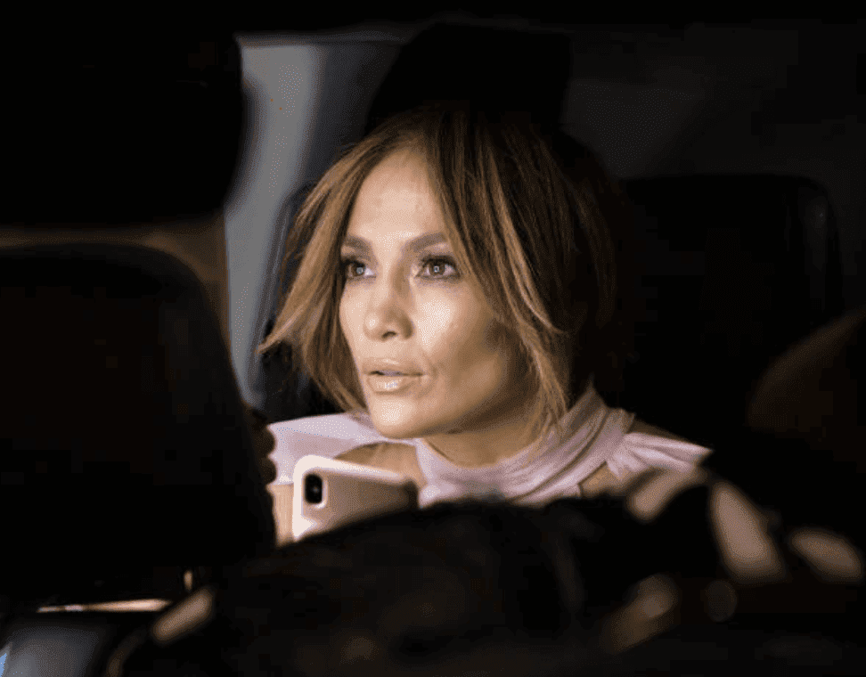 Jennifer Lopez sitting in a car while filming on location for the movie "Marry Me," on November 15, 2019 in New York City | Source: James Devaney/GC Images