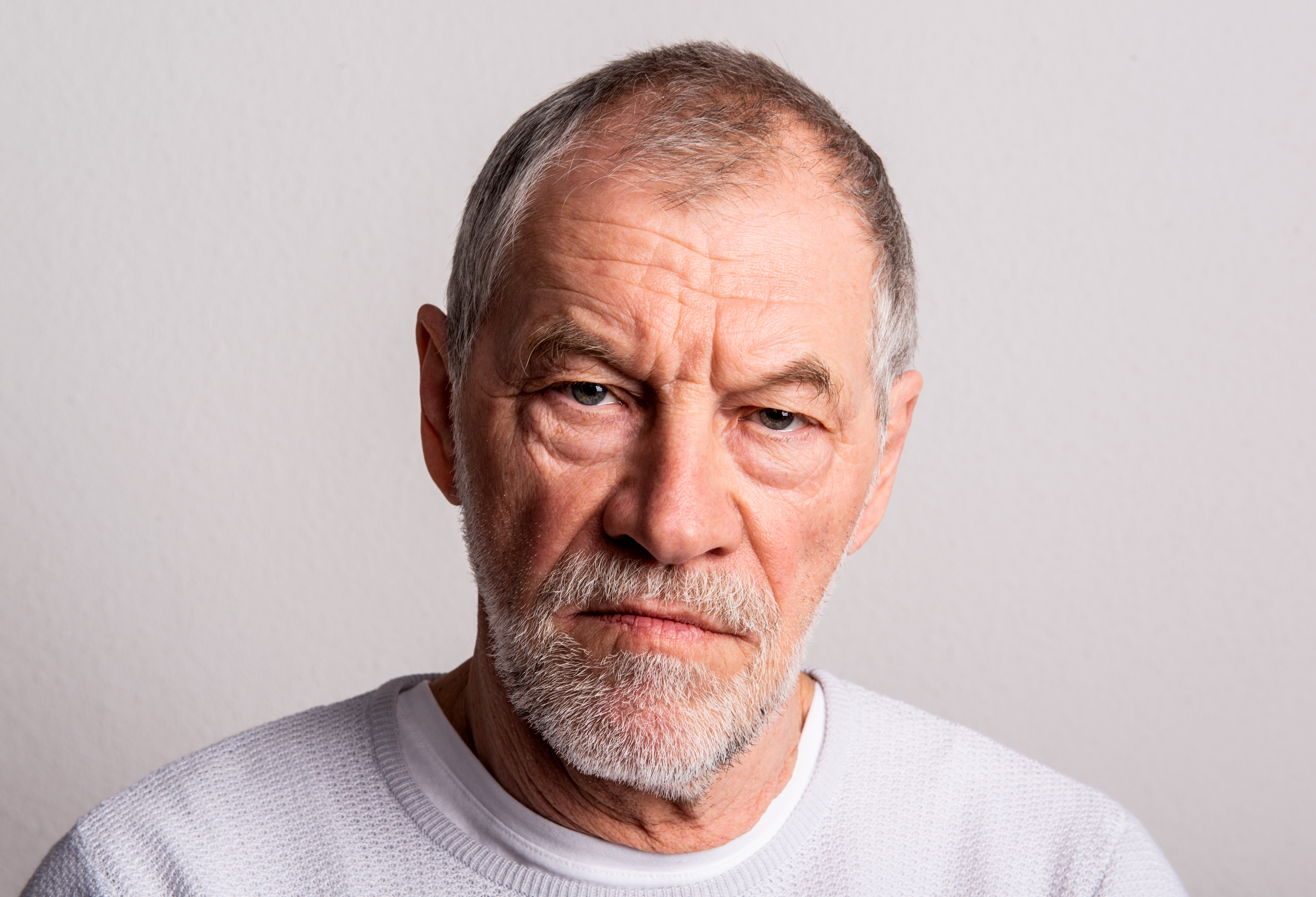 Portrait of a serious senior man | Source: Shutterstock