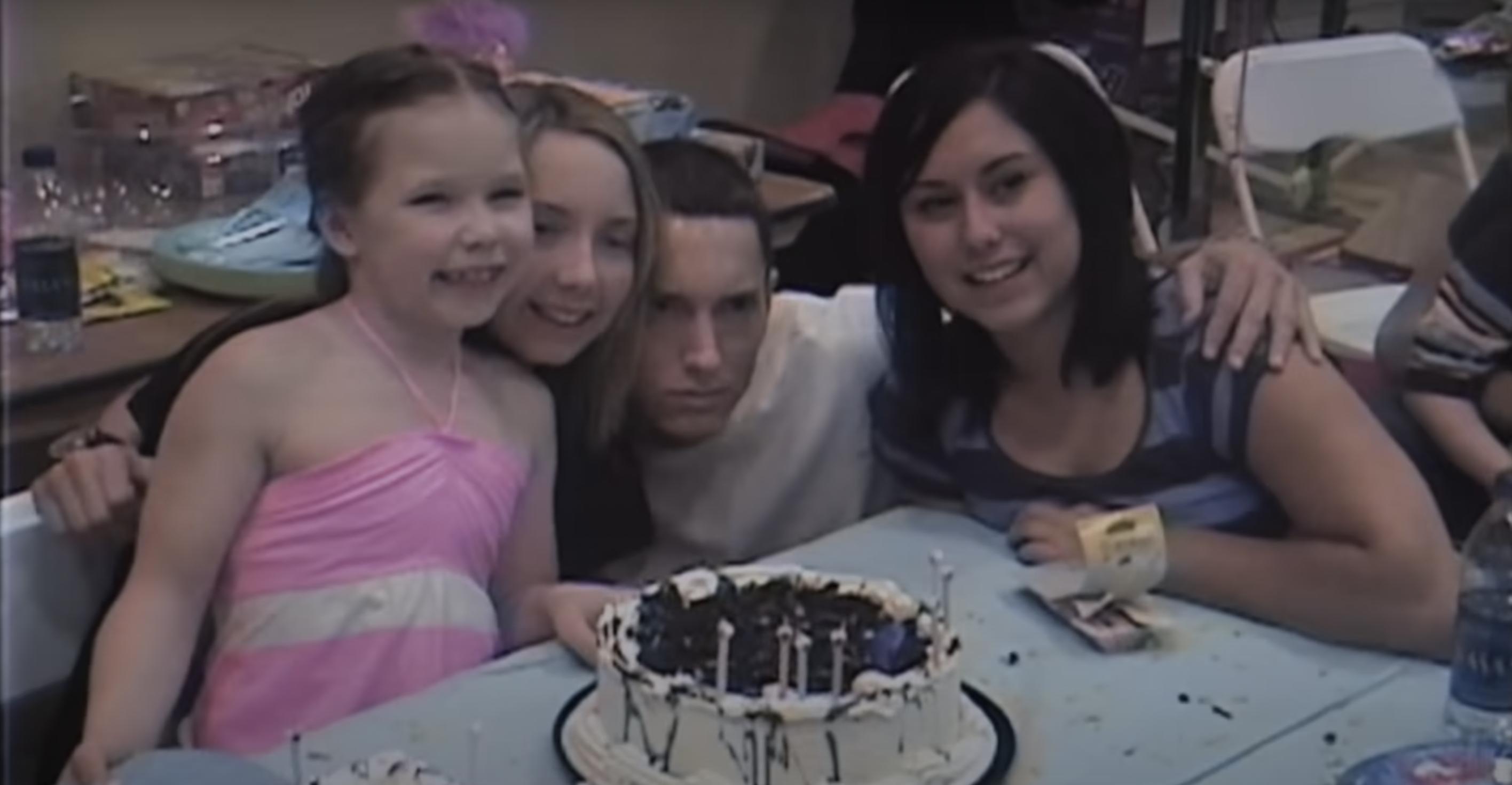 Eminem, Hailie Jade, and other people in a clip uploaded on October 3, 2024 | Source: YouTube/EminemMusic