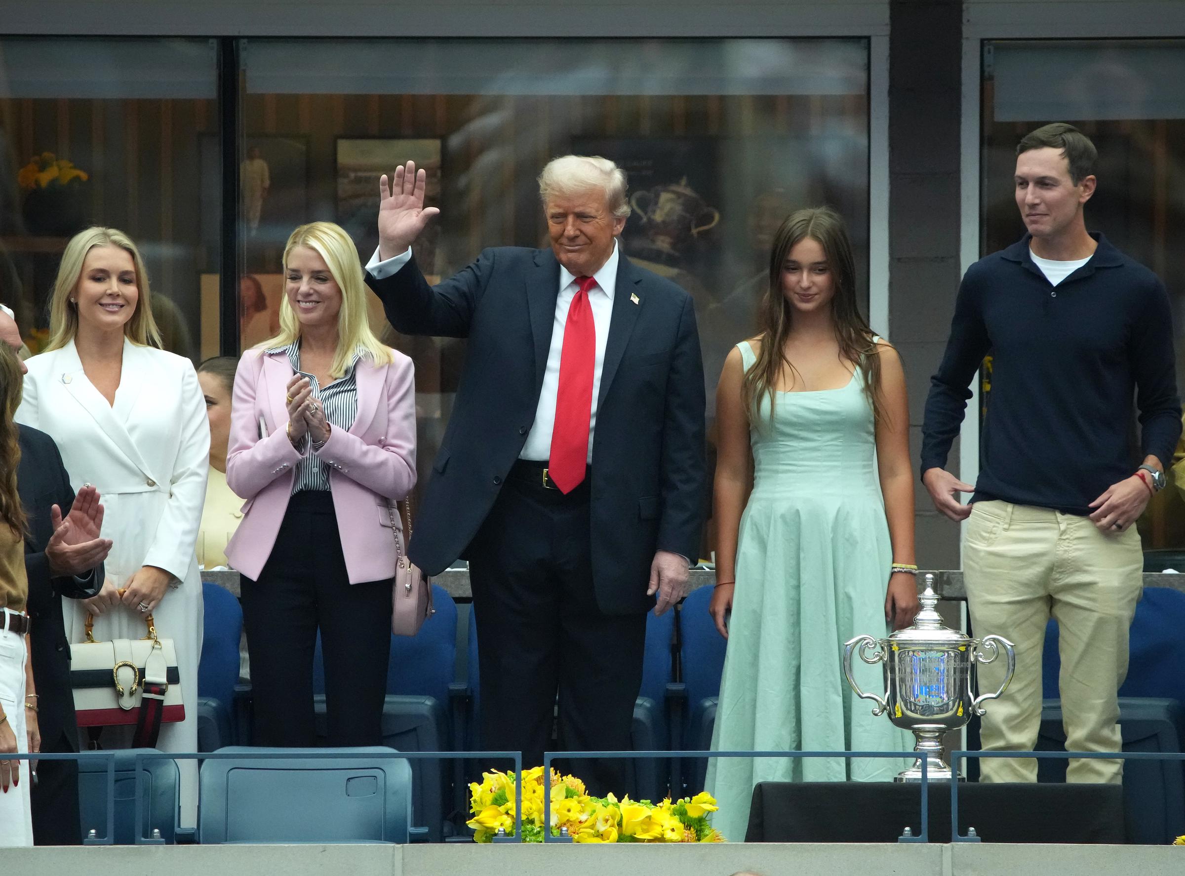 President Donald Trump, Donald's granddaughter, Arabella Kushner and her father, Jared look on before the start of the U.S. Open men's singles final at the Billie Jean King National Tennis Center in New York City on September 7, 2025 | Source: Getty Images