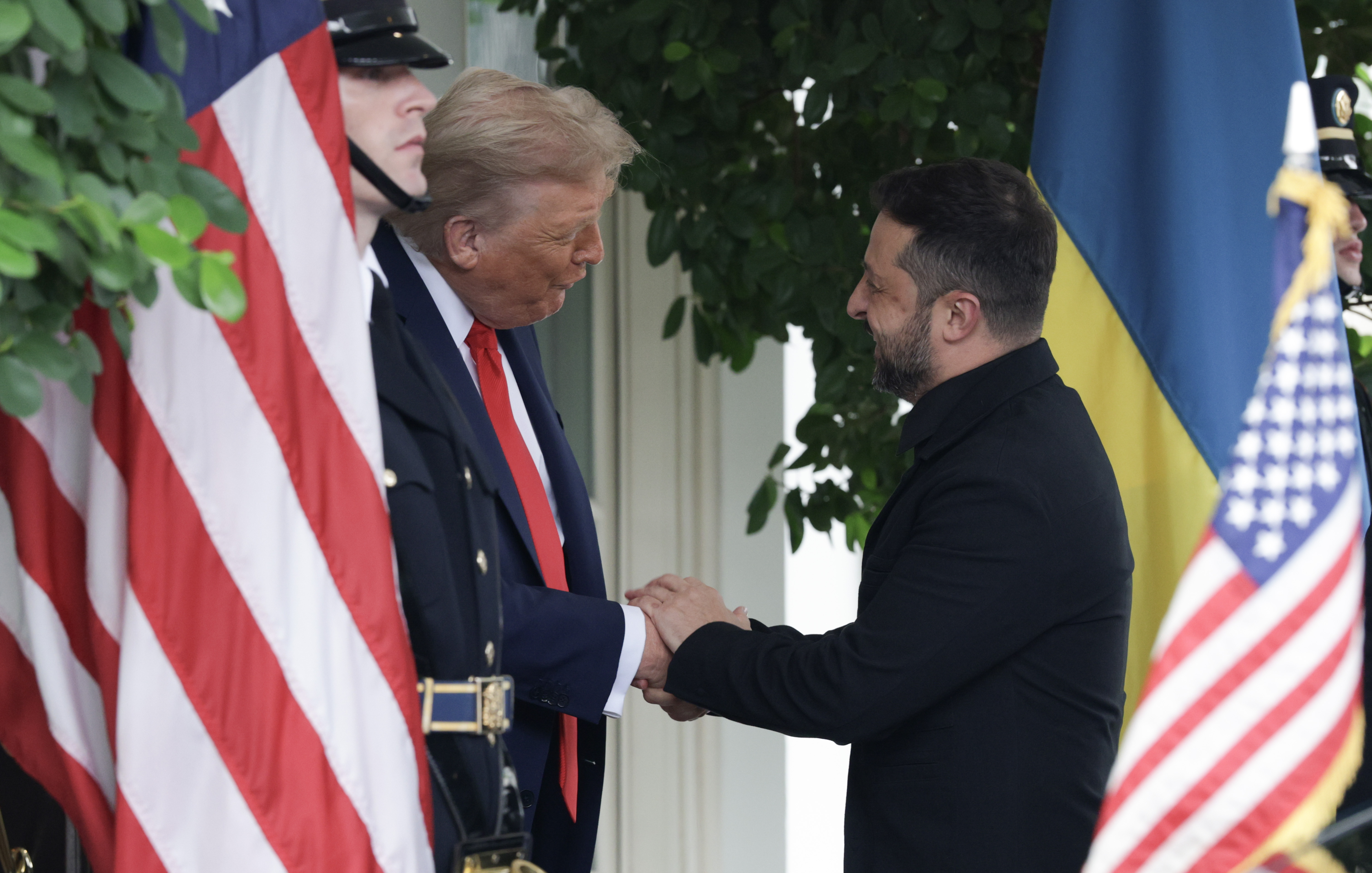 U.S. President Donald Trump greets Ukrainian President Volodymyr Zelenskyy at the White House in Washington, DC on August 18, 2025 | Source: Getty Images