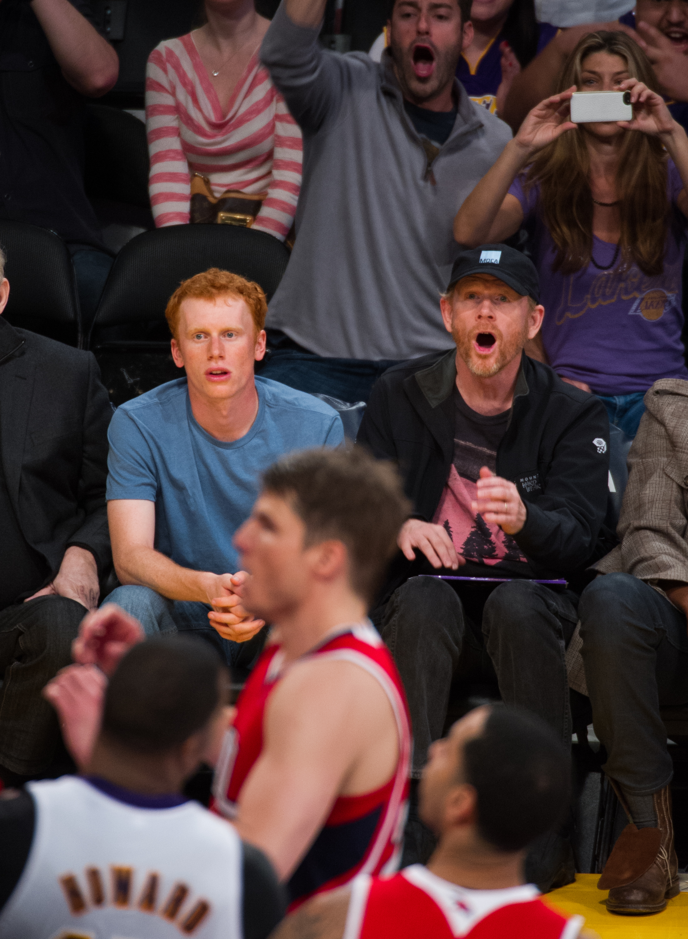 Reed Howard and Ron Howard at a basketball game at Staples Center on March 3, 2013 in Los Angeles, California. | Source: Getty Images