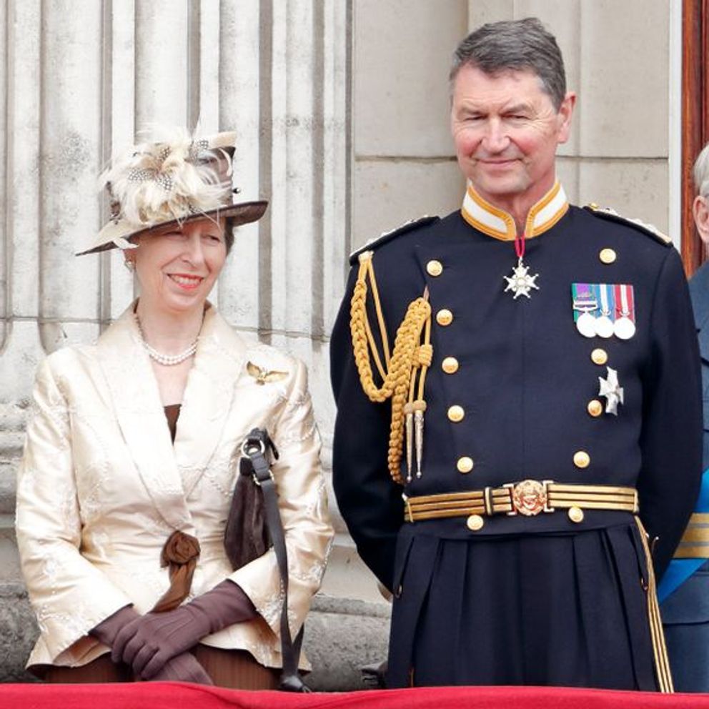 Princess Anne, Princess Royal and Vice Admiral Sir Tim Laurence take part in a flypast to mark 100 years of the Royal Air Force from the balcony of Buckingham Palace on July 10, 2018 in London, England |  Source: Getty Images