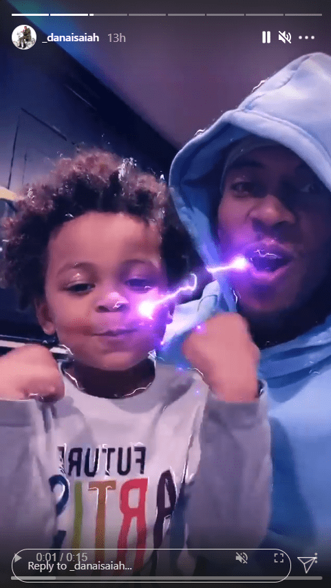 A screenshot from a clip of Jordin Sparks' son DJ posing with his dad, Dana Isaiah. | Photo: Instagram/_danaisaiah