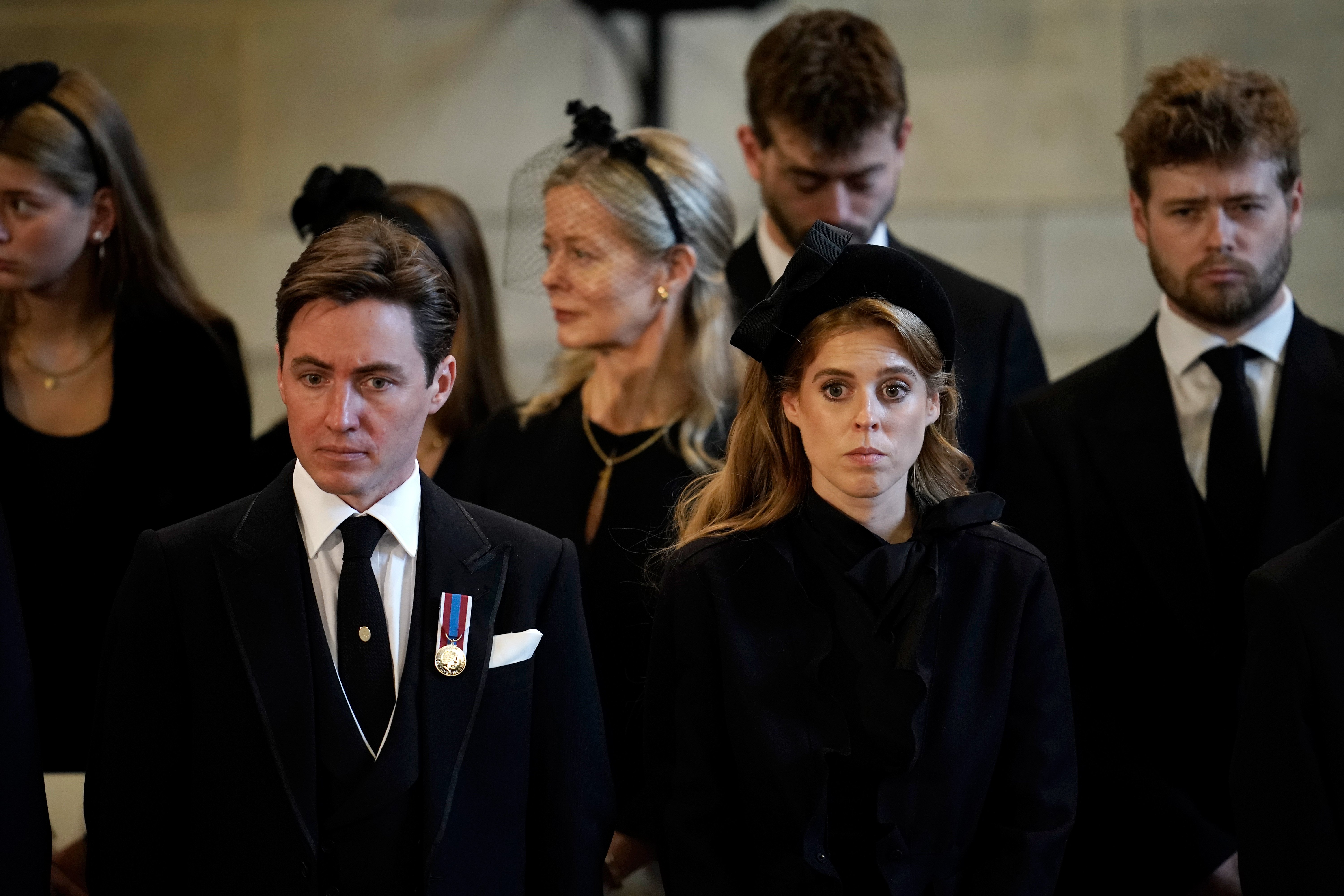 Edoardo Mapelli Mozzi and Princess Beatrice pay their respects in The Palace of Westminster during the procession for the Lying-in State of Queen Elizabeth II on September 14, 2022 in London, England | Source: Getty Images 