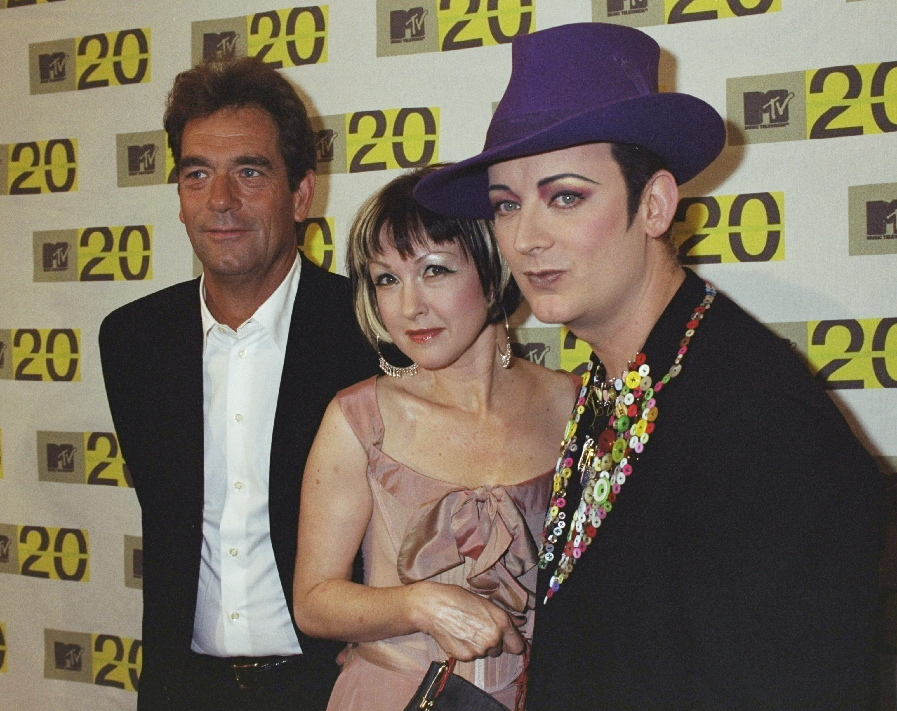 The singer, Cindy Lauper and Boy George during MTV's 20th anniversary celebration on January 1, 2001. | Source: Getty Images