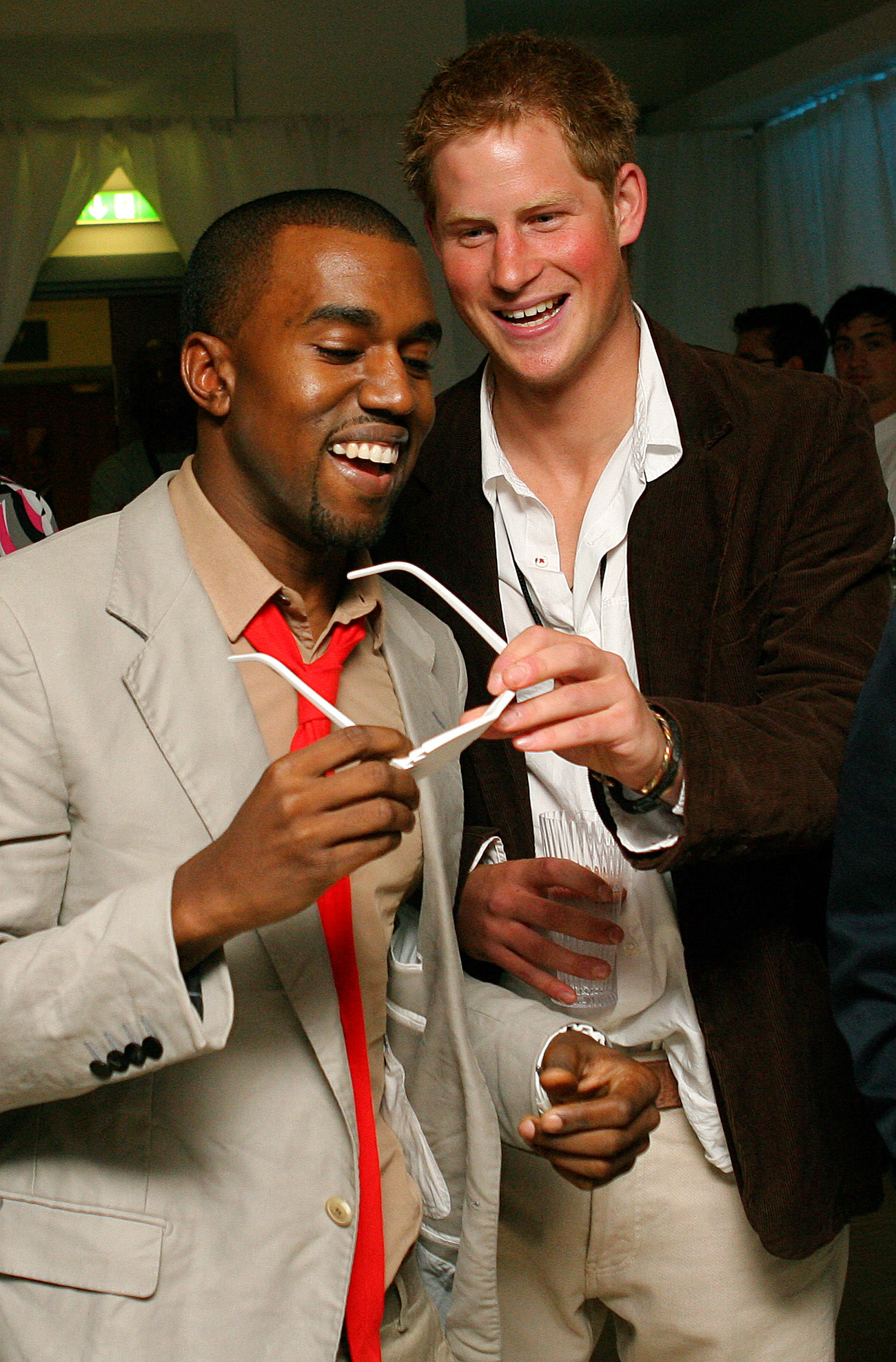 Later that evening, Prince Harry was photographed sharing a laugh with Kanye West, playfully inspecting the rapper's signature shutter shades. The light-hearted moment revealed a different side to the prince — one that embraced the energy of the night while letting go of royal formality.
