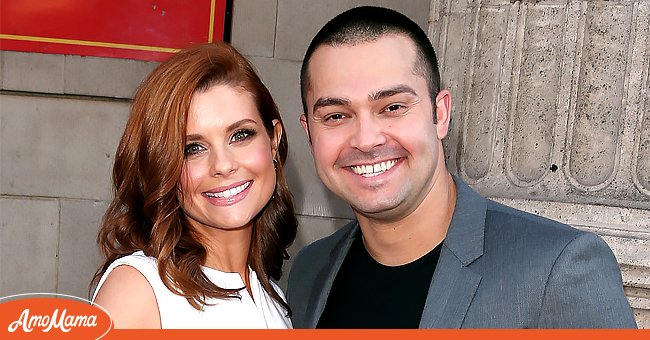 Actress JoAnna Garcia Swisher and her husband professional baseball player Nick Swisher attends the Screening of ABC's "Once Upon A Time" Season 4 at the El Capitan Theatre on September 21, 2014 in Hollywood, California. | Photo: Getty Images