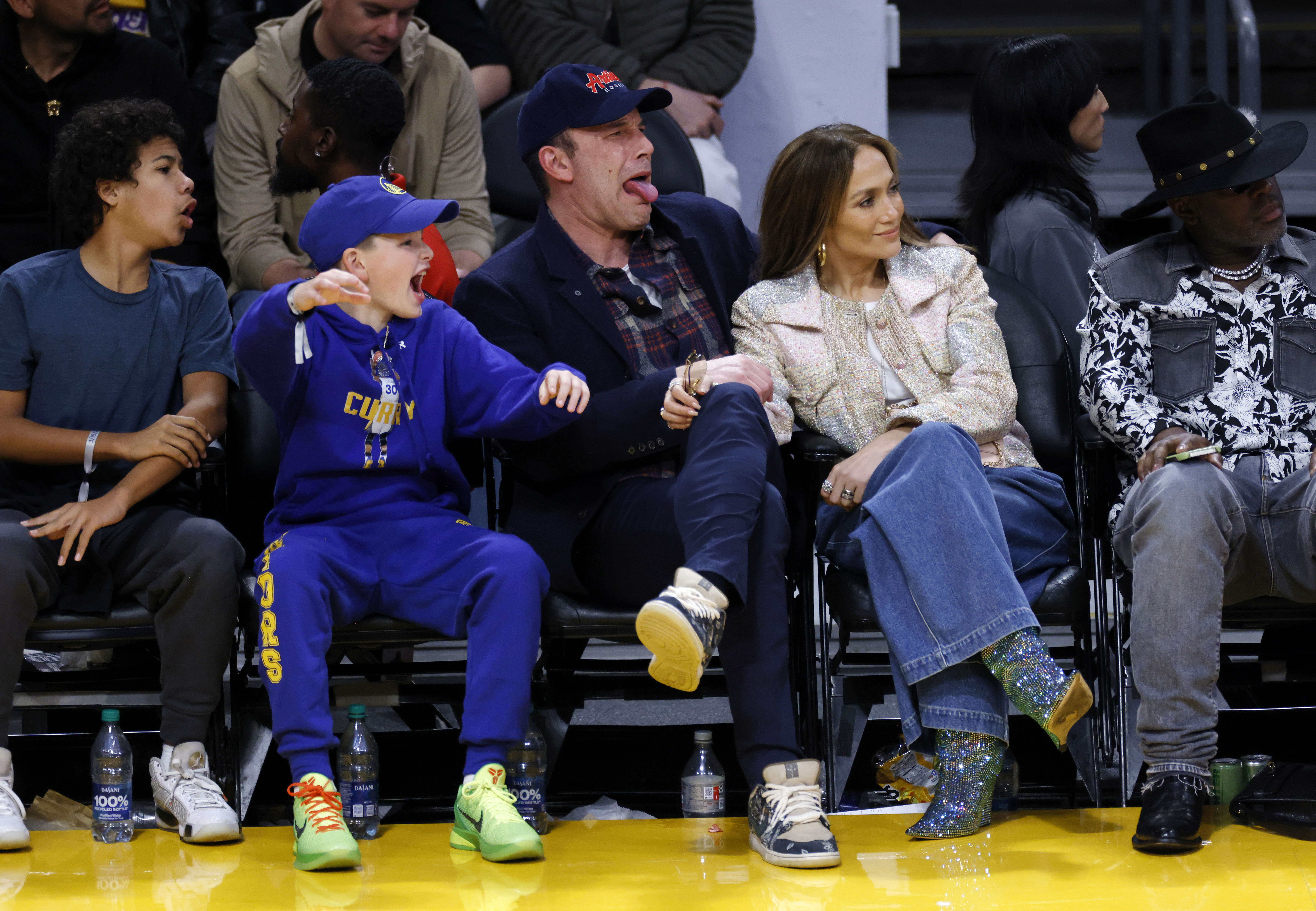 Jennifer Lopez, Ben Affleck, and Samuel Affleck at a Lakers vs. Warriors basketball game at the Crypto.com Arena on March 16, 2024 in Los Angeles, California | Source: Getty Images