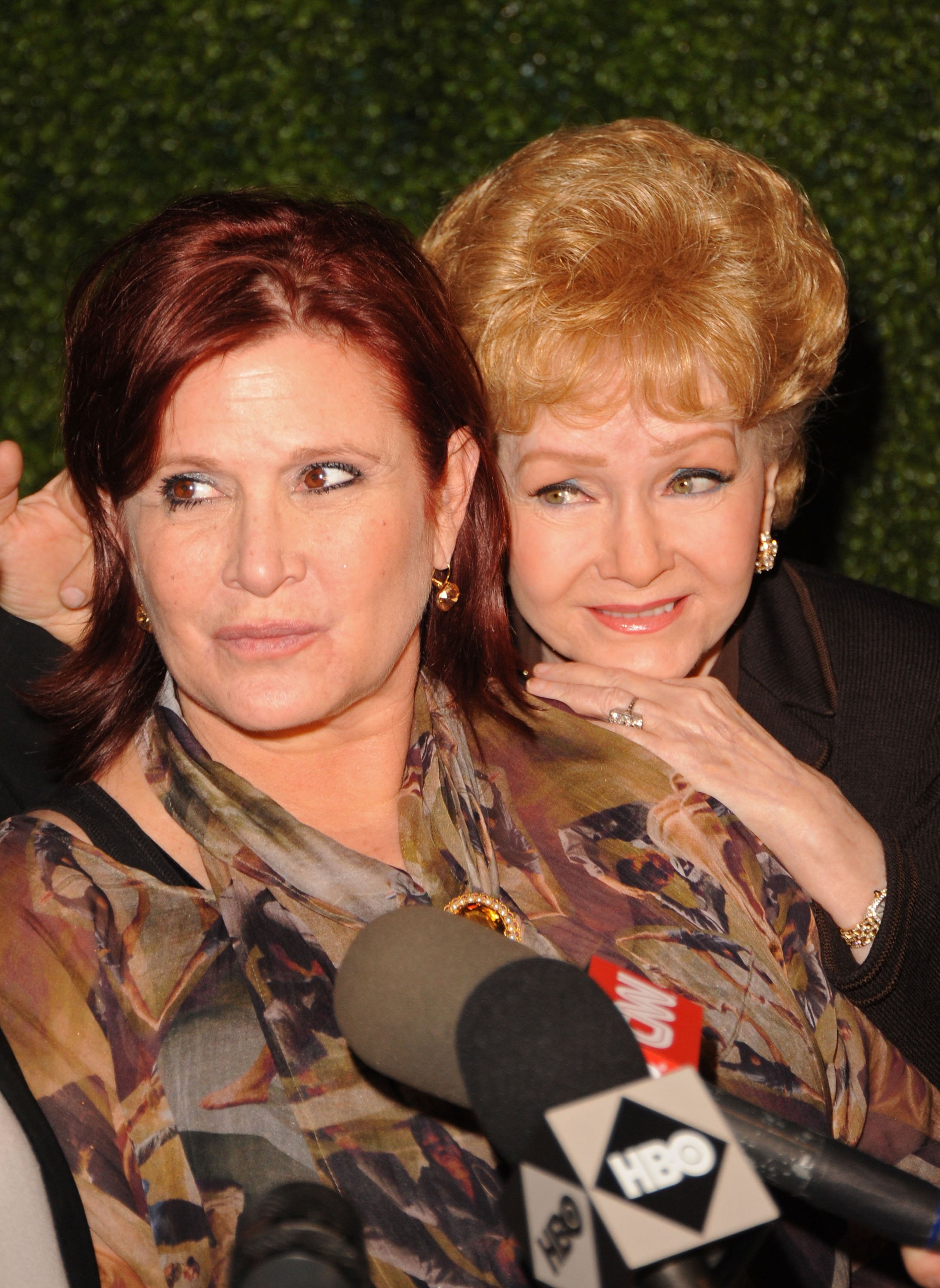 Actresses Carrie Fisher and Debbie Reynolds arrive at the HBO premiere of "Wishful Drinking" held at the Linwood Dunn Theater at the Pickford Center for Motion Study on December 7, 2010 in Hollywood, California. | Source: Getty Images