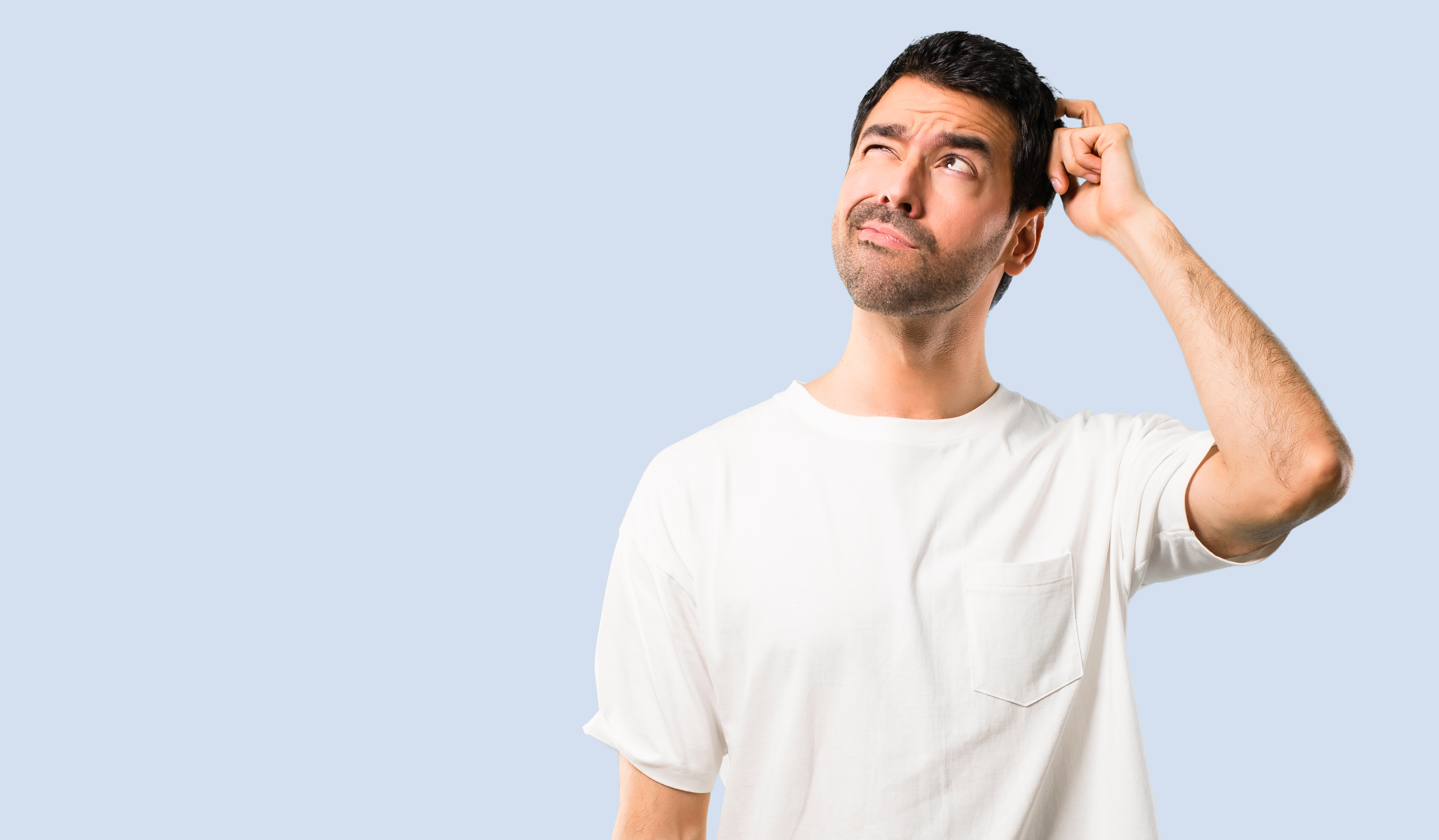 A man scratching his head | Source: Shutterstock